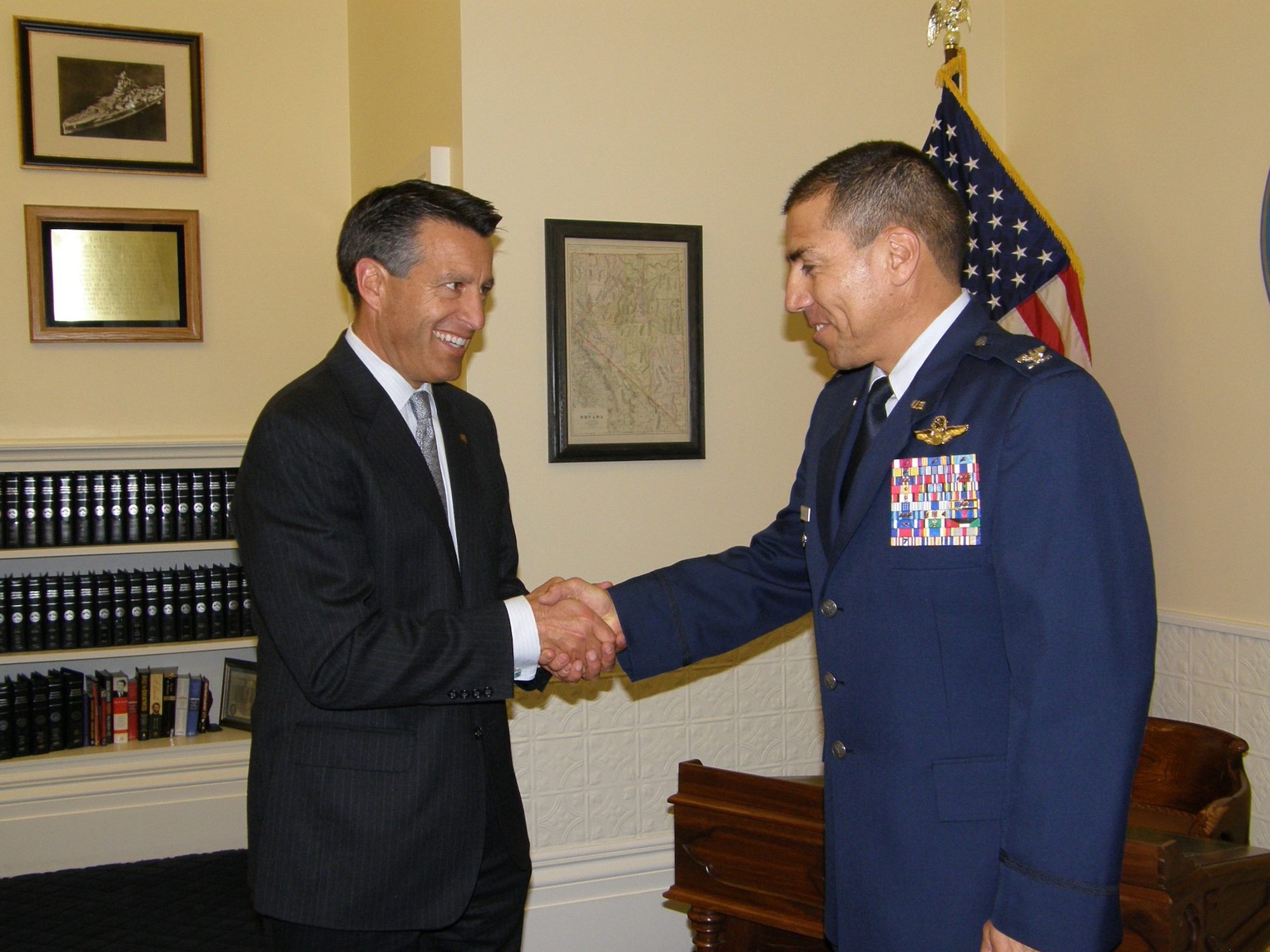 Gov. Brian Sandoval, left, congratulates Col. Caesar Garduno after Garduno was promoted to colonel at a promotion ceremony at the Capitol on Friday.

Photo by Lt. Col. Terry Conder, Joint Force Headquarters Public Affairs
