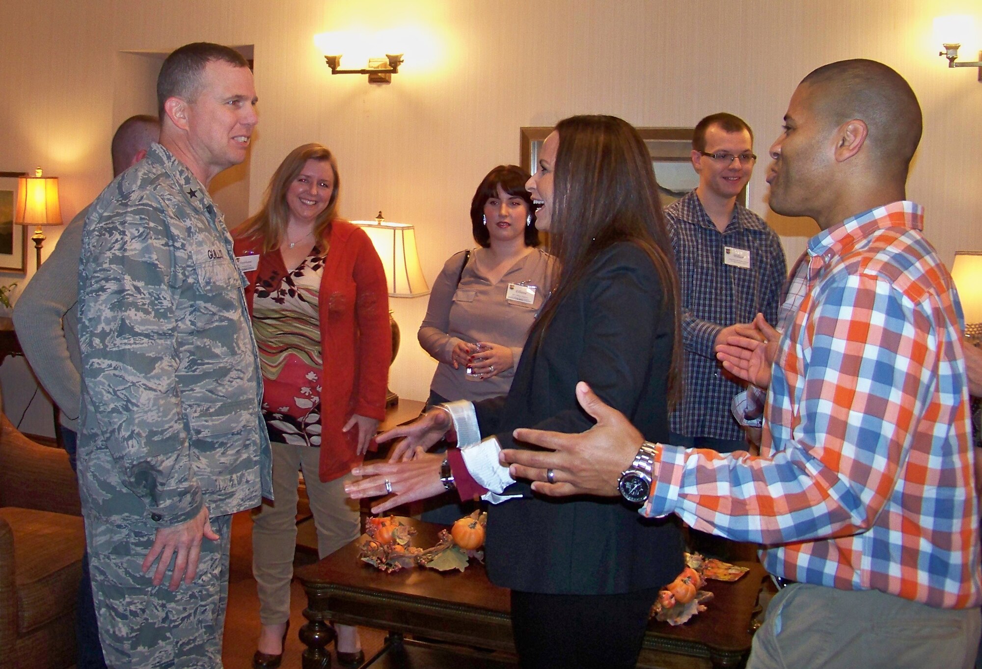 U.S. Air Force Brig. Gen. Gregory Guillot, 55th Wing commander, talks with attendees at the first-ever Offutt Key Spouses appreciation event Oct. 14. There are 122 keys spouses who are appointed by unit commanders and act as liaisons between the unit and its families. The event was held to personally thank them for all they do throughout the year. (U.S. Air Force photo by Mark Borytsky/Released)