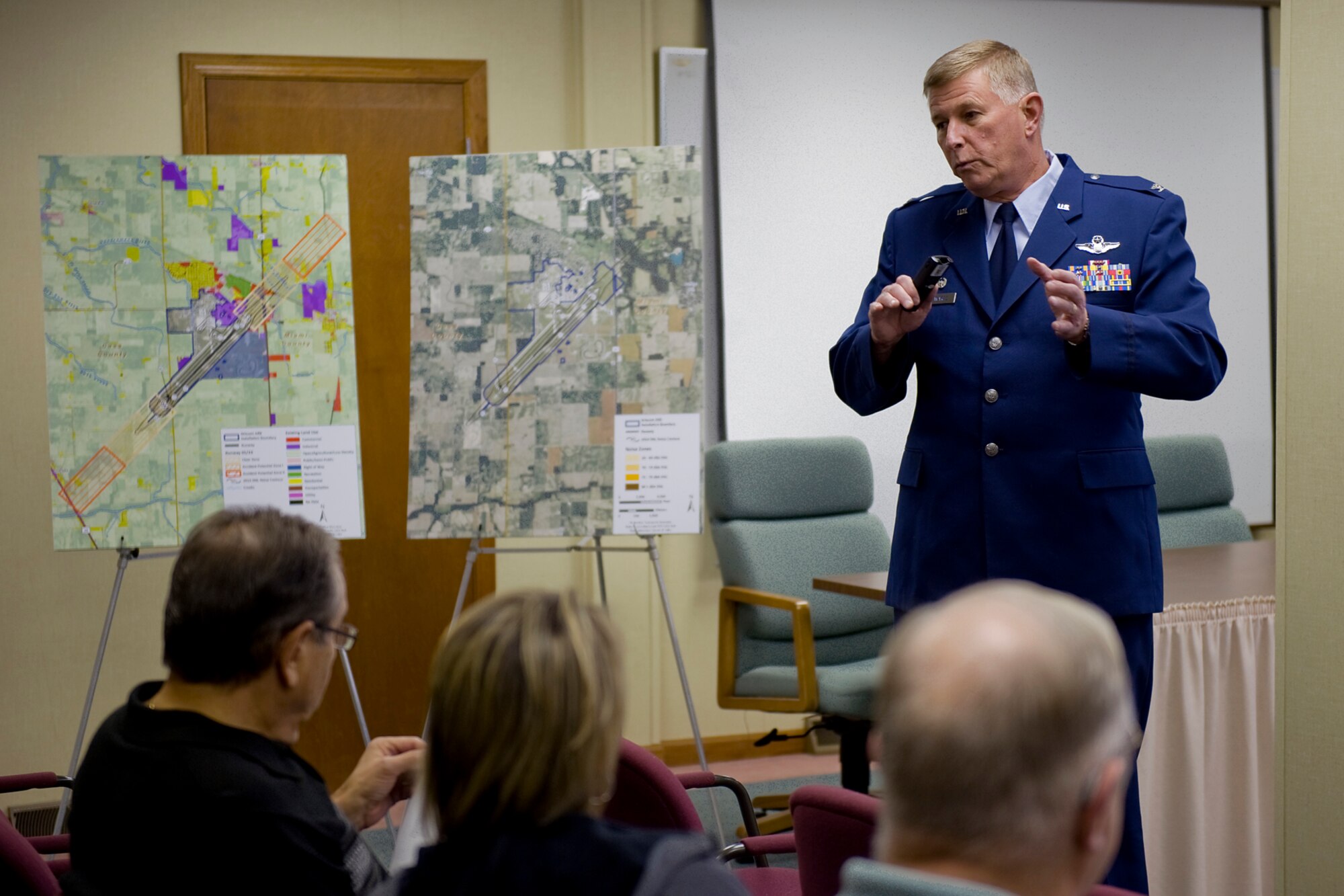 Col. Doug Schwarz, 434th Air Refueling Wing commander, briefs members of the public on the results of a recently released air installation compatible use zone study during a public meeting in Peru, Ind., Oct. 23, 2014. During the meeting, the AICUZ results showed that Grissom's noise contour levels above 65 decibels had reduced by 20 percent when compared to the last study done in 1995. (U.S. Air Force photo/Mark R. W. Orders-Woempner)
