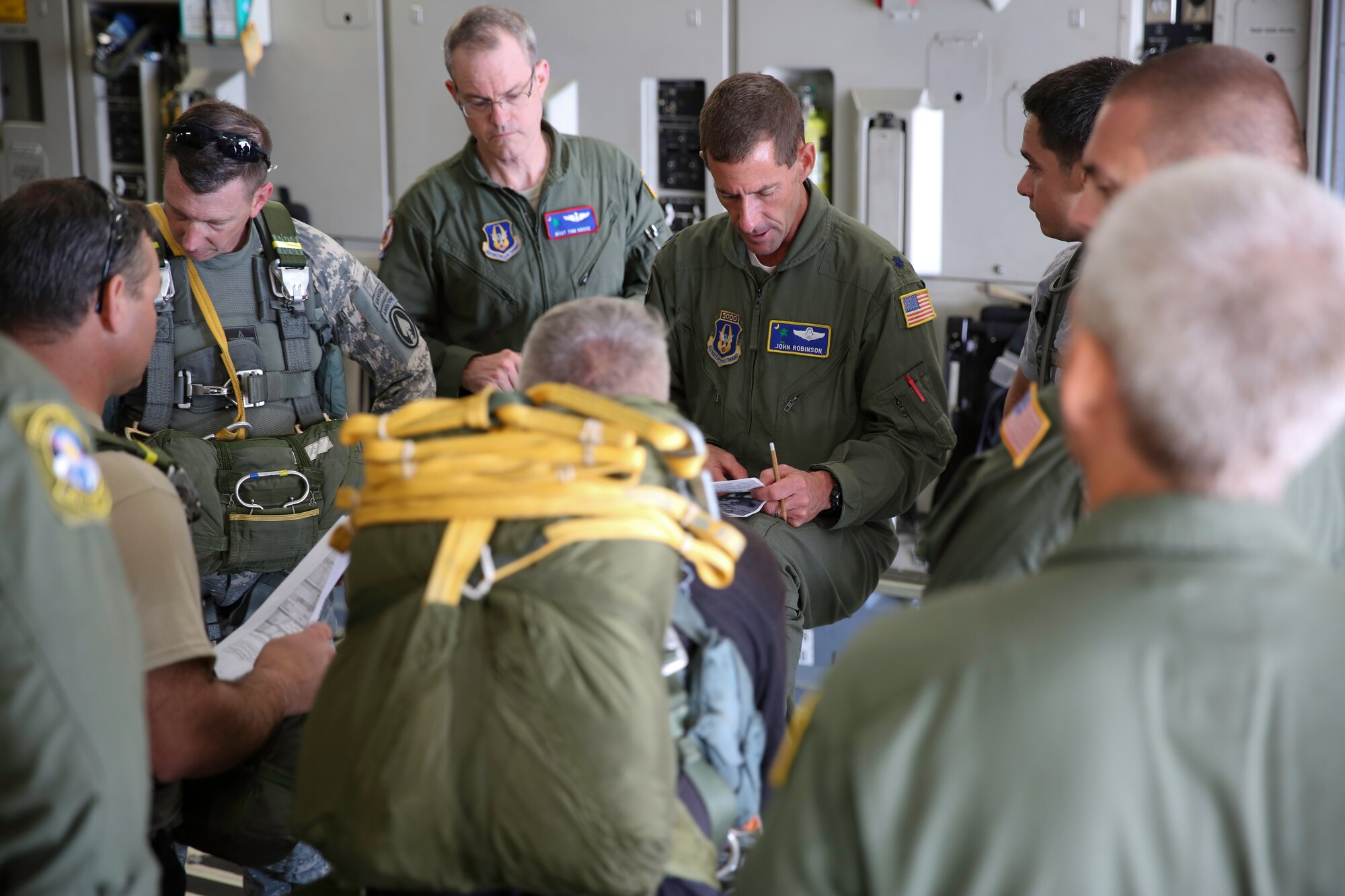 Lt. Col. John Robinson, 315th Operations Support Squadron chief of tactics and Key West Mission aircraft commander, gives a flight briefing Oct. 18, 2014 at Key West Naval Air Station, Fla. The four-day training mission included 117 members from the 315th AW and was part of the wing’s Unit Effectiveness Inspection training, which is the U.S. Air Force’s new way of evaluating a unit’s wartime, contingency and force sustainment readiness. (U.S. Air Force Photo by Tech. Sgt. Shane Ellis)