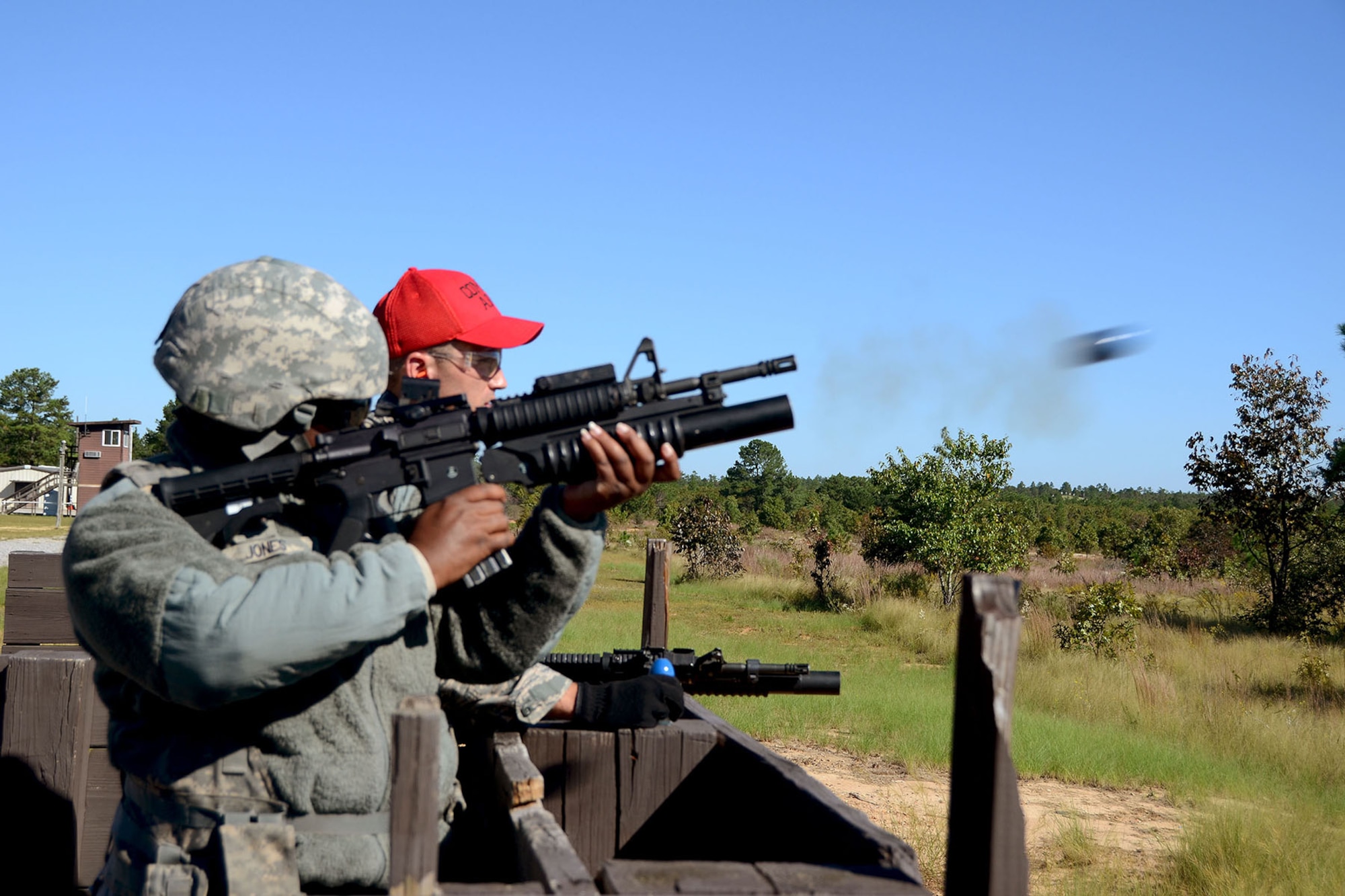 Airmen of the South Carolina Air National Guard, assigned to the 169th Security Forces Squadron at McEntire Joint National Guard Base, engage in heavy weapons familiarization at Bastogne Range, Fort Jackson, S.C., Oct. 5, 2014.  Routine weapons training ensures Airmen of the South Carolina Air National Guard are trained and prepared to perform their mission at home and abroad. (U.S. Air National Guard photo by Airman 1st Class Ashleigh S. Pavelek/Released)