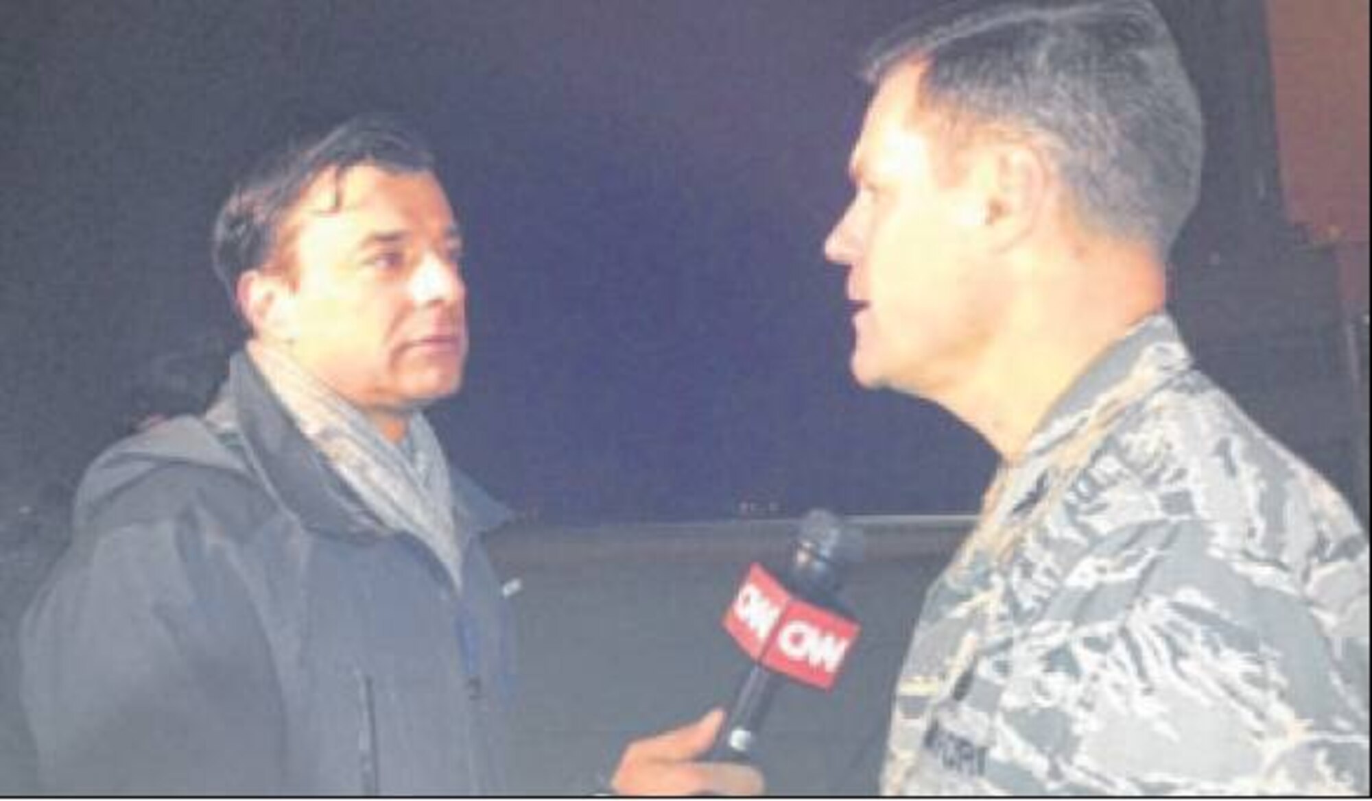 Col. John Devillier, 88th Air Base Wing commander, met briefly with reporters, including CNN, following the arrival of Jeffrey Fowle at Wright-Patterson Air Force Base Oct. 22. The Department of Defense provided transportation to return Fowle to American soil. Fowle lives in Miamisburg, Ohio, about 24 miles south of Wright-Patterson AFB. (Air Force photo by Marie Vanover, 88th Air Base Wing Public Affairs)