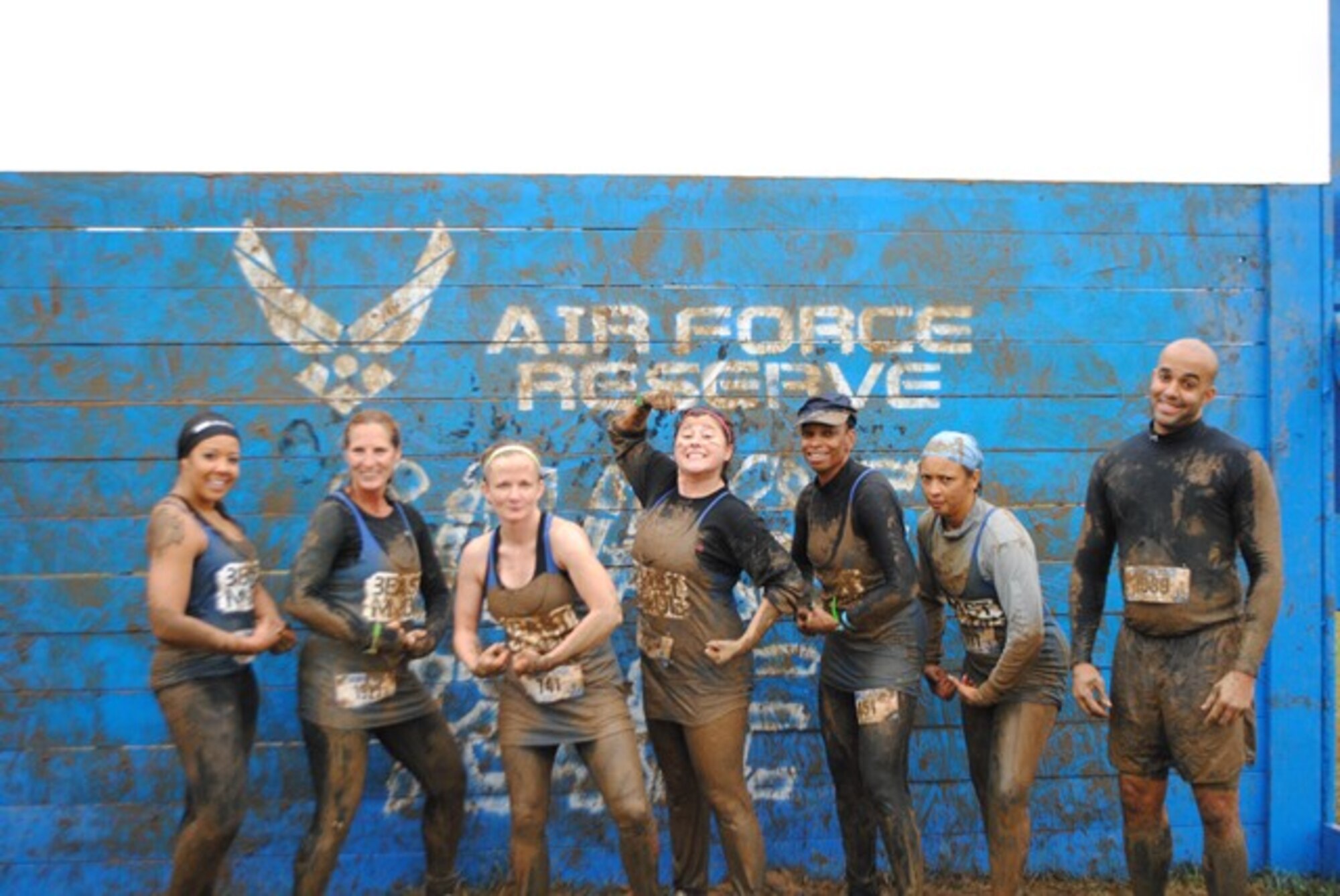 Members of the Air Force Reserve's 512th Airlift Wing, located on Dover Air Force Base, Del., participated in the Mid-Atlantic Savage Race Oct. 11, 2014, at Hopkins Farm, Md. The Air Force Reserve was the premiere sponsor for the obstacle race, which was 4-to-6-miles long and had more than 20 obstacles along the way. (Courtesy Photo)