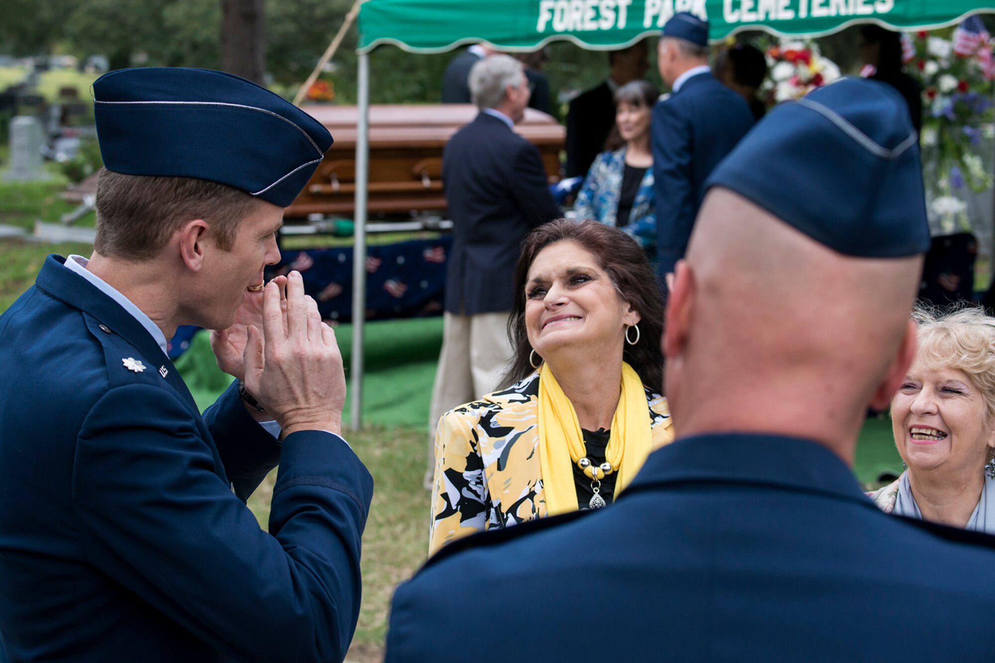 U.S. Air Force Lt. Col. Heath Wharton, former 11th Bomb Squadron (BS) commander, shares a story about his friend, Claude McCrocklin, who was laid to rest on Oct. 23, 2014, Shreveport, La. McCrocklin, a former World War II B-24 bombardier and Prisoner of War, was an adopted member of the 11th BS and made regular visits to the squadron. (U.S. Air Force photo by Master Sgt. Greg Steele/Released)