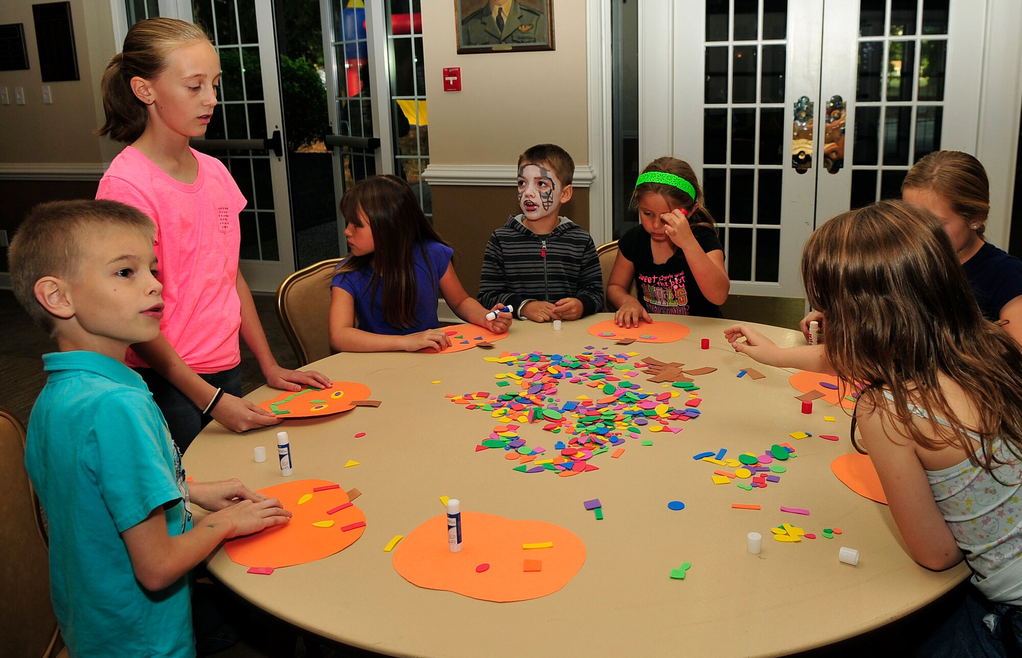 Team Seymour kids engage in some arts and crafts during a “Hearts Apart” event Oct. 24, 2014, at Seymour Johnson Air Force Base, North Carolina. The event focused on relieving the pressures families sustain when a member is deployed and served as a venue to ensure families are connected with the wing’s many helping agencies and resources. (U.S. Air Force photo/Airman 1st Class Shawna Keyes)