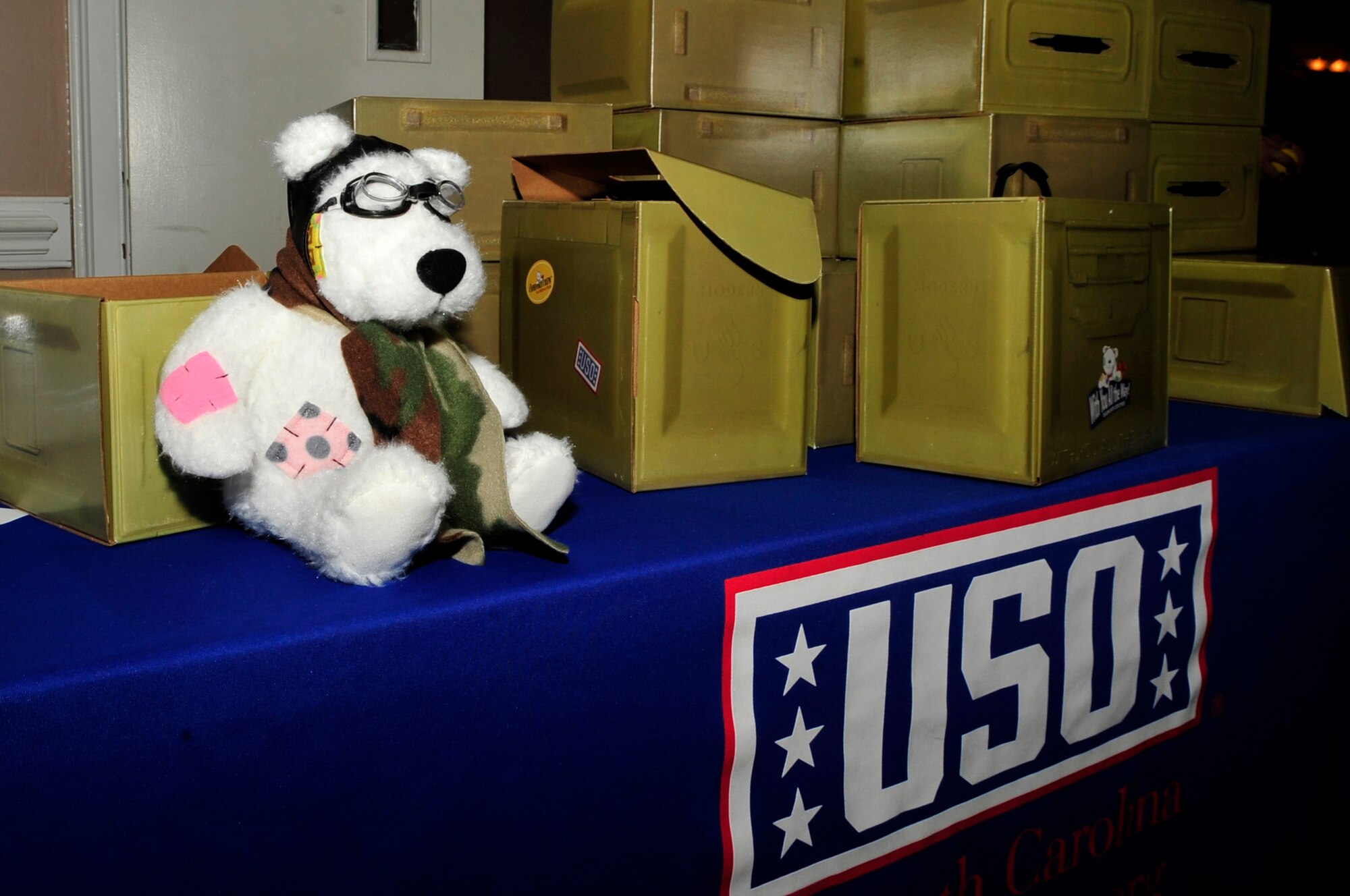 Care packages with teddy bears were handed out courtesy of the USO during a “Hearts Apart” event Oct. 24, 2014, at Seymour Johnson Air Force Base, North Carolina. The event focused on relieving the pressures families sustain when a member is deployed and served as a venue to ensure families are connected with the wing’s many helping agencies and resources. (U.S. Air Force photo/Airman 1st Class Shawna Keyes)