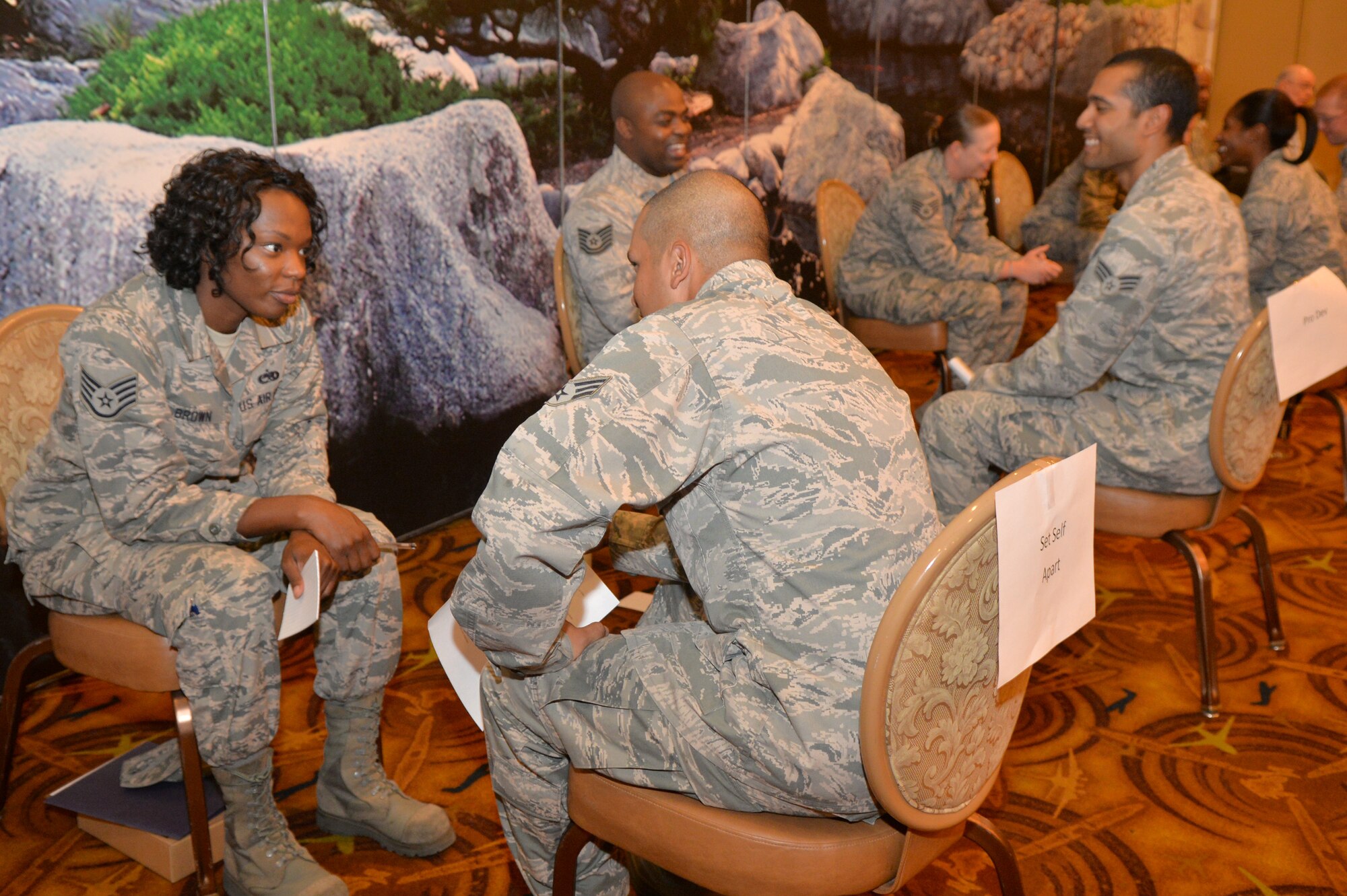 Staff Sgt. Brianne Brown, 56th Equipment Maintenance Squadron aircraft armament technician, mentors Senior Airman Jose Resto-Sifuentes, 309th Aircraft Maintenance Unit crew chief, on the topic of “setting yourself apart” at a speed mentoring event Oct. 15 at Luke Air Force Base. The L.E.A.D. Council and Focus 5/6 partnered to pair leaders from across the wing with Airmen, ranks E-1 through E-4, for a fast-paced mentoring session. Leadership, professional development, and education were just some of the topics discussed in the minute-and-a-half-long mentoring sessions. (U.S. Air Force photo/Senior Airman Jenna Sarvinski)