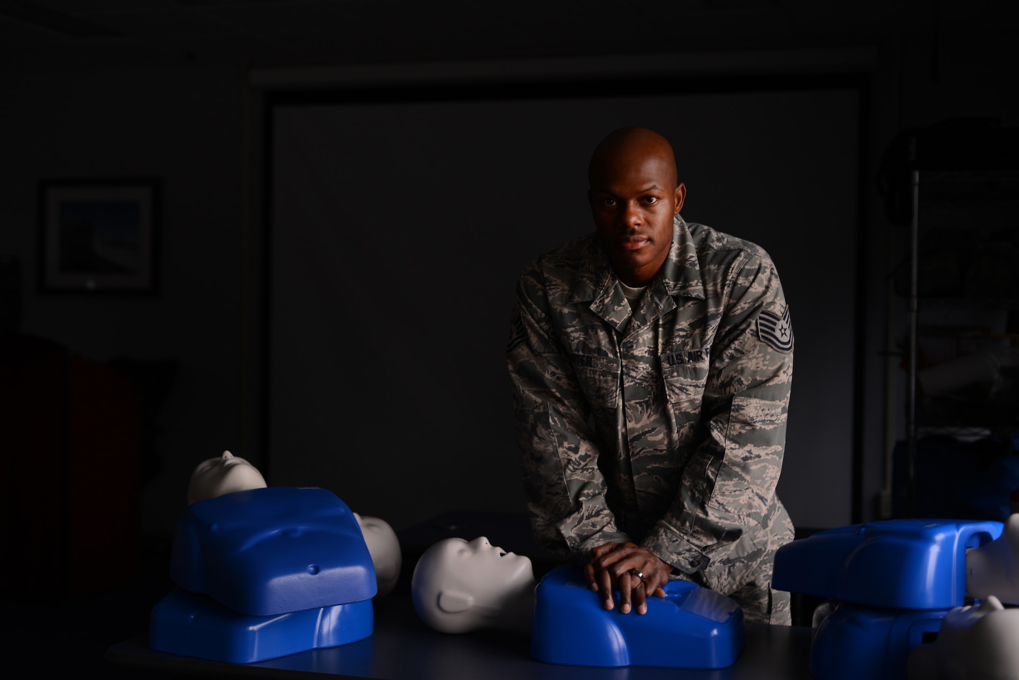 Tech. Sgt. Robert Niter, 47th Medical Group NCO in charge of optometry, poses for a portrait at the 47th Medical Group training classroom Oct. 23, 2014. Niter is the Basic Life Support program director for the 47th Flying Training Wing and is responsible for training individuals requiring cardiopulmonary resuscitation certification. (U.S. Air Force photo by Staff Sgt. Steven R. Doty)(Released)