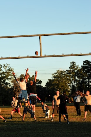 The 437th Aircraft Maintenance Squadron scores a field goal during an intramural flag football game Oct 21, 2014, at Joint Base Charleston, S.C. The 628th Civil Engineer Squadron defeated AMXS 24 - 14. (U.S. Air Force photo/Staff Sgt. Renae Pittman)