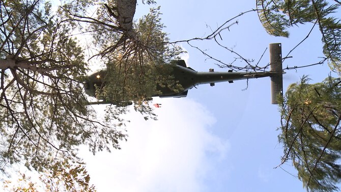 A U.S. Air Force HH-60G Pave Hawk helicopter arrives on the scene during a combat search and rescue training at an off base training site to rescue and transport the Airmen to Osan Air Base, Republic of Korea, Oct. 16, 2014. The role of the helicopter is to recover personnel under stressful conditions, including search and rescue. (U.S. Air Force photo by Senior Airman Lindy Pata/Released)