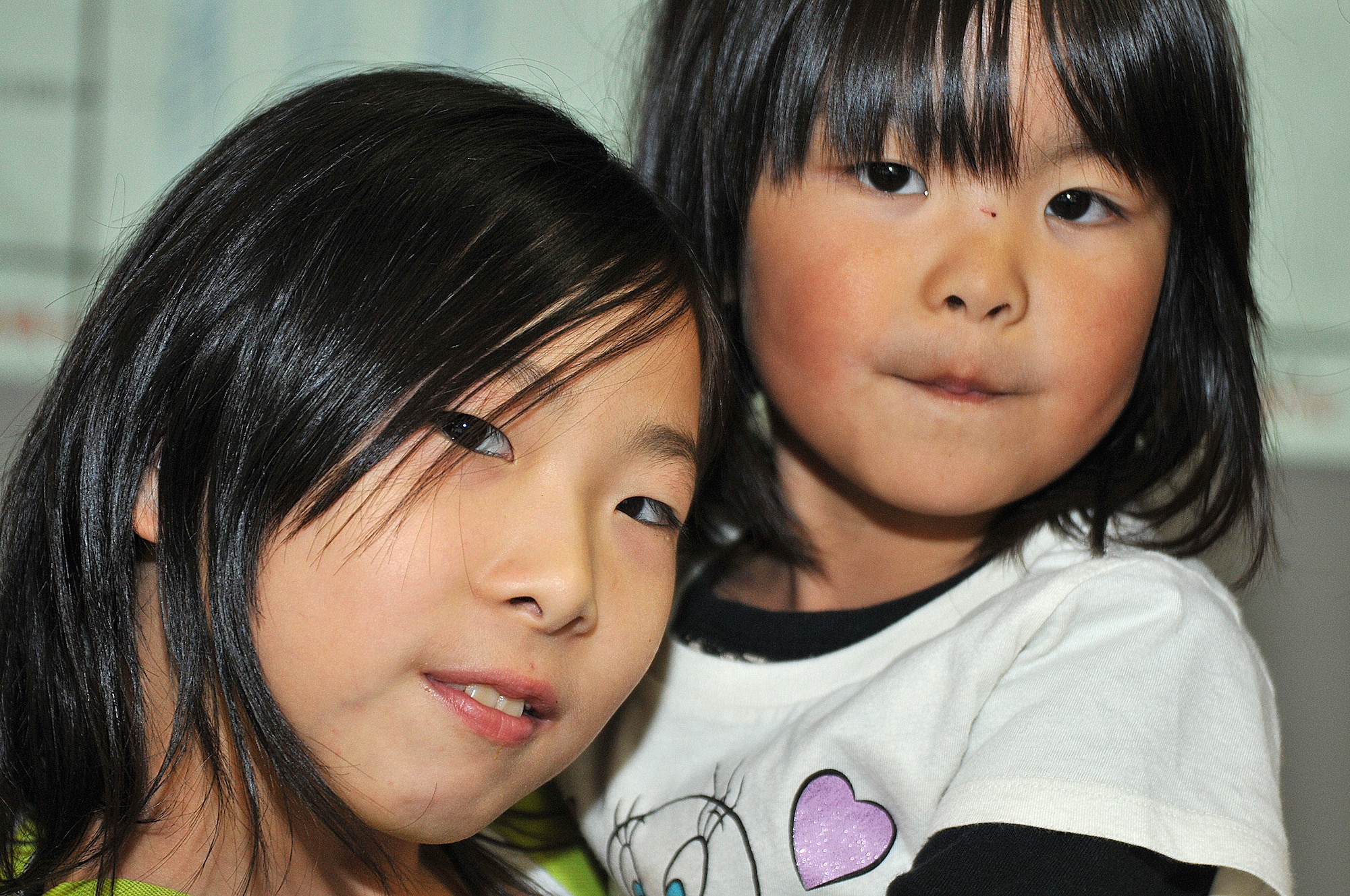 Children from the Biko-en Children’s Care House in Shichinohe, Japan, pose for a photo during a visit from the Misawa’s First Four Organization, Oct. 18, 2014. Despite the language barrier between the children and Airmen, everyone worked together to enjoy their visit. (U.S. Air Force photo by Senior Airman Jose L. Hernandez-Domitilo/Released)
