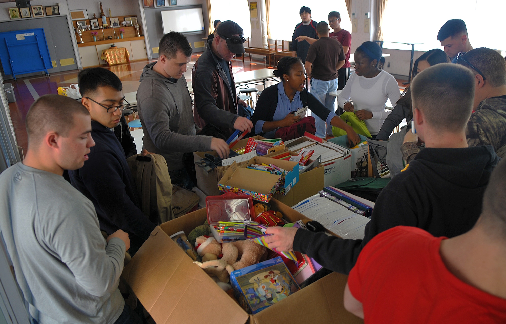 U.S. Air Force Airmen from Misawa’s First Four Organization organize backpacks with school supplies for children at the Biko-en Children’s Care House in Shichinohe, Japan, Oct. 18, 2014. The backpacks included pencils, pens, notebooks, markers, binders and rulers. (U.S. Air Force photo by Senior Airman Jose L. Hernandez-Domitilo/Released)