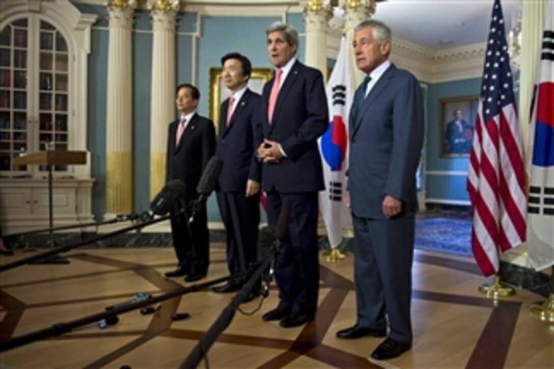 U.S. Defense Secretary Chuck Hagel, far right, joins U.S. Secretary of State John F. Kerry, second from right, as Kerry announces a meeting with South Korean Foreign Minister Yun Byung-se and South Korean Defense Minister Han Min-koo at the U.S. State Department in Washington, D.C., Oct. 24, 2014. The leaders met to discuss matters of mutual importance.