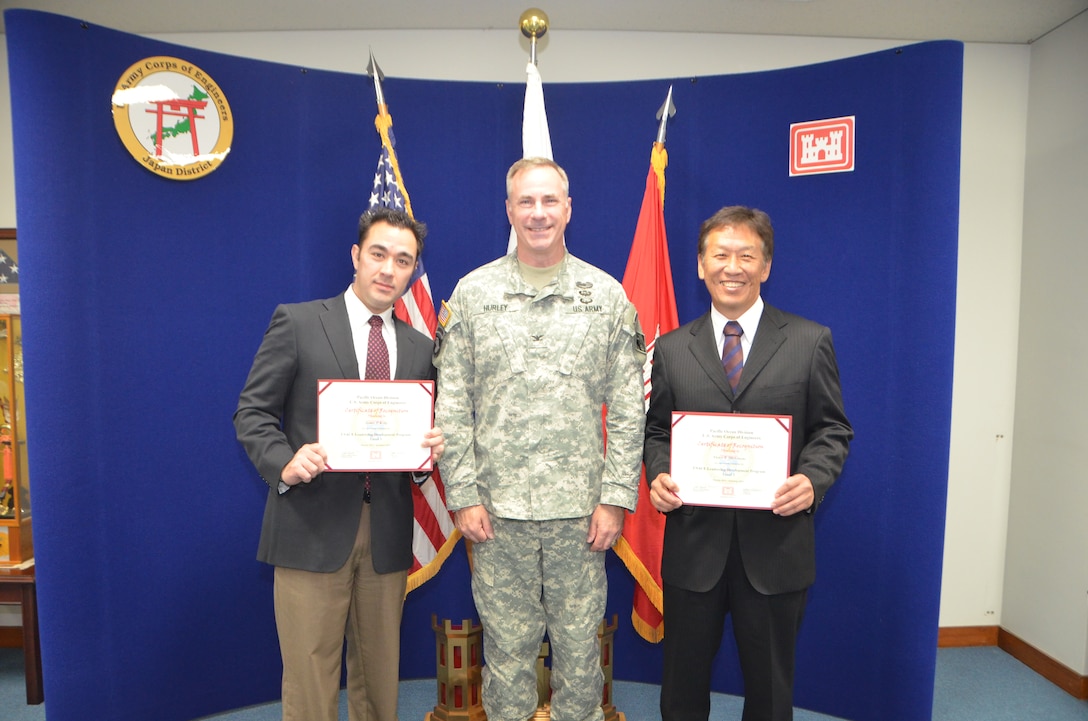 U.S. Army Corps of Engineers, Japan District Commander Col. John Hurley (center) shown with James Kelly (left) and Victor Michimoto (right), recent graduates of Pacific Ocean Division's USACE Leadership Development Level 3 Program. Kelly and Michimoto were honored during a ceremony Oct. 15 that linked participants by video teleconference from the division headquarters at Fort Shafter, Hawaii. Through its ULDP program, POD is developing civilian leaders who will encourage innovation, teamwork and partnerships to maximize the organization efficiency and effectiveness. Congratulations James and Victor!

