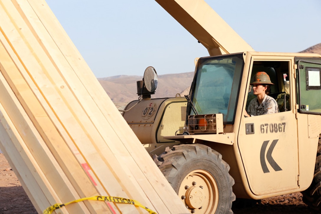 U.S. Marine Corps Cpl. Ashley K. Lee, a heavy equipment operator with Combat Logistics Battalion 11 (CLB-11), 11th Marine Expeditionary Unit (MEU), and native of Zanesville, Ohio, operates a 5K fork lift to move supplies during a beach landing at D’Arta Plage, Djibouti, as part of the initial stages of sustainment training, Oct. 25. Marines from the 11th MEU are deployed with the Makin Island Amphibious Ready Group (ARG) as a flexible, adaptable and persistent force in the U.S. 5th Fleet area of responsibility. (U.S. Marine Corps photos by Gunnery Sgt. Rome M. Lazarus/Released) 