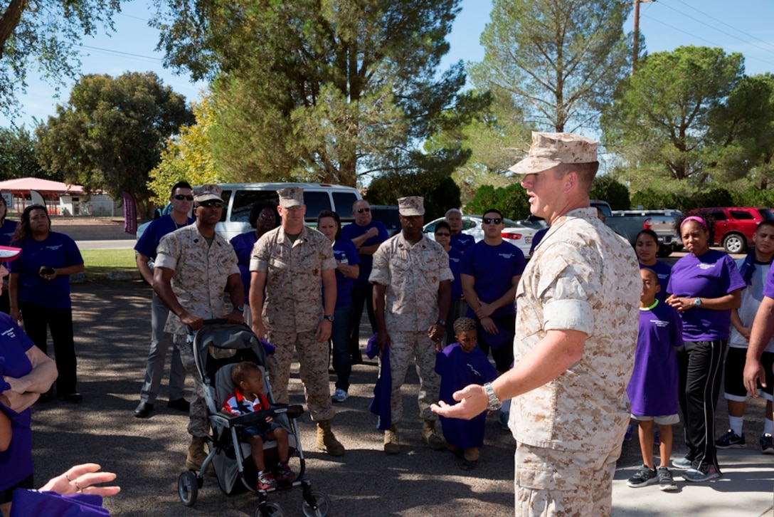 Lt. Col. Thomas Favor, Executive Officer of Marine Corps Logistics Base, Barstow, speaks to attendees of the Domestic Violence Survivor Walk held aboard the installation on 21 October.