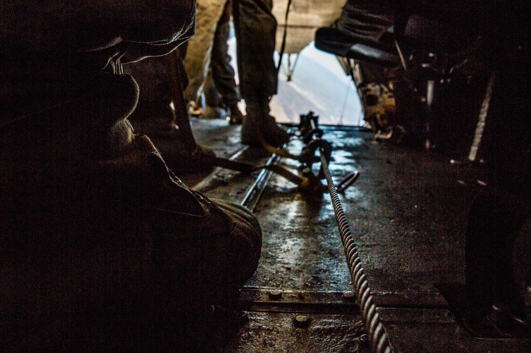 U.S. Marines with Force Reconnaissance Detachment, 15th Marine Expeditionary Unit, prepare to jump from a CH-53E Super Stallion aircraft during airborne sustainment training aboard Camp Pendleton, Calif., Oct. 21, 2014. The Force Recon Detachment is scheduled to deploy with the 15th MEU next spring. (U.S. Marine Corps photo by Sgt. Emmanuel Ramos/Released)