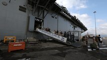 U.S. Marines participating in the exercise Bold Alligator embark on the USS Kearsarge (LHD 3) at its home port, Naval Operations Base Norfolk, Va., Oct. 22, 2014. Bold Alligator is a multi-national, synthetic naval amphibious exercise designed to train across the full range of amphibious capabilities in order to provide unique and contemporary solutions to global challenges.