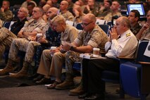 U.S. Marines, sailors, and Coalition forces assigned to 2nd Marine Expeditionary Brigade (MEB) attend a transition brief in support of exercise Bold Alligator 14, at Naval Operations Base Norfolk, Va., Oct. 25, 2014. Exercise Bold Alligator 14 is a multi-national, synthetic naval amphibious exercise designed to train the full range of amphibious capabilities in order to provide unique and contemporary solutions to global challenges.
