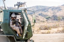 Marines with Battery Q, 5th Battalion, 11th Marine Regiment, enter coordinates into an M142 High Mobility Artillery Rocket System during a live-fire exercise aboard Marine Corps Base Camp Pendleton, Calif., Oct. 22, 2014. Conducting live-fire exercises strengthens the Marines’ ability to fire effectively in future operations.