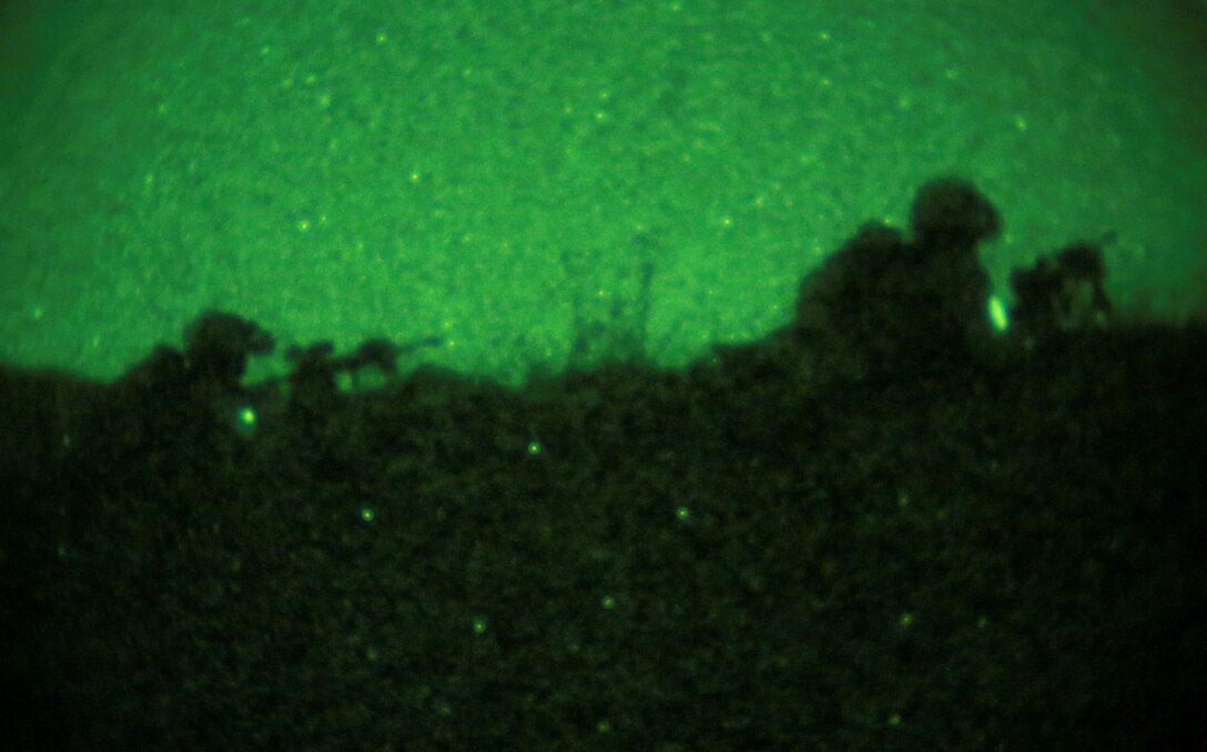U.S. Marines with Kilo Company, Battalion Landing Team, 3rd Battalion, 1st Marine Regiment, 15th Marine Expeditionary Unit, provide security during a simulated mechanized night raid aboard Camp Pendleton, Calif., Oct. 23, 2014. BLT 3/1 is the 15th MEU’s ground combat element.  (U.S. Marine Corps photo by Cpl. Steve H. Lopez/Released)