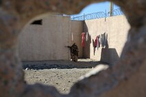 Marines with 1st Platoon, Company C, 1st Battalion, 4th Marine Regiment, conduct urban operations training at the Infantry Immersion Trainer aboard Marine Corps Base Camp Pendleton, Calif., Oct. 24, 2014. The IIT assists Marines in sharpening their basic combat skills by creating a realistic combat environment. Civilian role players occupy the training town, acting as either innocent bystanders, allied armed forces, law enforcement personnel or enemy insurgents, most of whom don’t speak English when in character.
