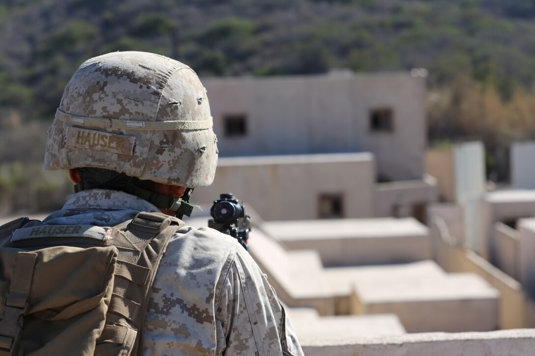 Marines with 1st Platoon, Company C, 1st Battalion, 4th Marine Regiment, conduct urban operations training at the Infantry Immersion Trainer aboard Marine Corps Base Camp Pendleton, Calif., Oct. 24, 2014. The IIT assists Marines in sharpening their basic combat skills by creating a realistic combat environment. Civilian role players occupy the training town, acting as either innocent bystanders, allied armed forces, law enforcement personnel or enemy insurgents, most of whom don’t speak English when in character.