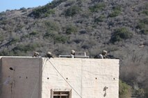 Marines with 1st Platoon, Company C, 1st Battalion, 4th Marine Regiment, conduct urban operations training at the Infantry Immersion Trainer aboard Marine Corps Base Camp Pendleton, Calif., Oct. 24, 2014. The IIT assists Marines in sharpening their basic combat skills by creating a realistic combat environment. Civilian role players occupy the training town, acting as either innocent bystanders, allied armed forces, law enforcement personnel or enemy insurgents, most of whom don’t speak English when in character.