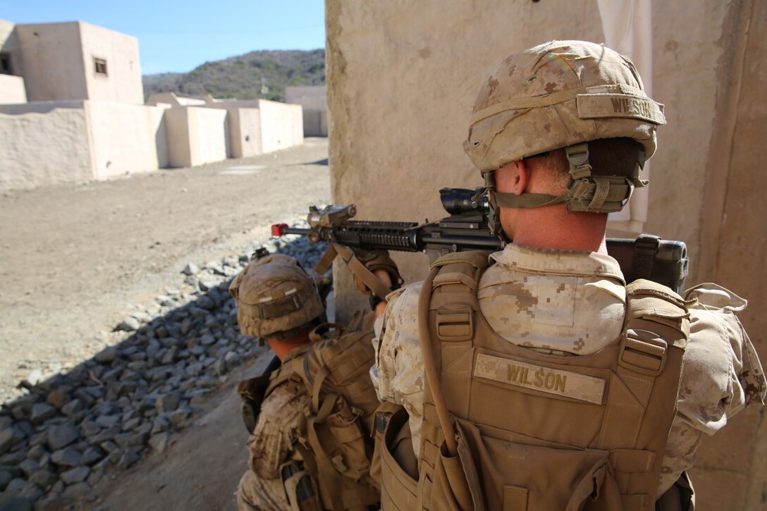 Marines with 1st Platoon, Company C, 1st Battalion, 4th Marine Regiment, conduct urban operations training at the Infantry Immersion Trainer aboard Marine Corps Base Camp Pendleton, Calif., Oct. 24, 2014. The IIT assists Marines in sharpening their basic combat skills by creating a realistic combat environment. Civilian role players occupy the training town, acting as either innocent bystanders, allied armed forces, law enforcement personnel or enemy insurgents, most of whom don’t speak English when in character.