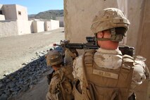 Marines with 1st Platoon, Company C, 1st Battalion, 4th Marine Regiment, conduct urban operations training at the Infantry Immersion Trainer aboard Marine Corps Base Camp Pendleton, Calif., Oct. 24, 2014. The IIT assists Marines in sharpening their basic combat skills by creating a realistic combat environment. Civilian role players occupy the training town, acting as either innocent bystanders, allied armed forces, law enforcement personnel or enemy insurgents, most of whom don’t speak English when in character.