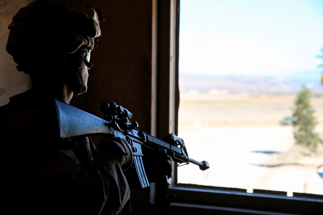 Marines with 1st Platoon, Company C, 1st Battalion, 4th Marine Regiment, conduct urban operations training at the Infantry Immersion Trainer aboard Marine Corps Base Camp Pendleton, Calif., Oct. 24, 2014. The IIT assists Marines in sharpening their basic combat skills by creating a realistic combat environment. Civilian role players occupy the training town, acting as either innocent bystanders, allied armed forces, law enforcement personnel or enemy insurgents, most of whom don’t speak English when in character.