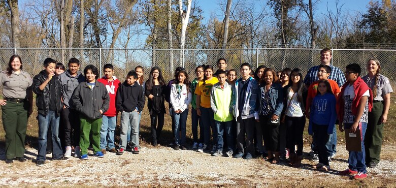 More than 35 eighth graders spend an afternoon with Corps members Angela Pletka, Andrew Barry and Ruth Bentzinger as they learn how to engage in careers in engineering, science and technology. 