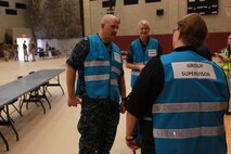DoD personnel and U.S. Sailors participate in Exercise Vigilant Response 2014 (VR14) aboard Marine Corps Air Station New River, N.C., Oct. 7, 2014. VR14 was a two-day exercise designed to test the ability to conduct command and control measures in response to a pandemic outbreak aboard the Air Station.