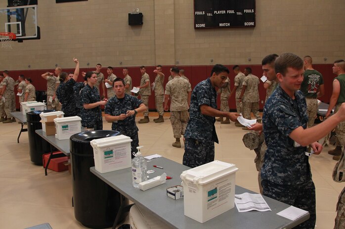 U.S. Marines and Sailors participate in Exercise Vigilant Response 2014 (VR14) aboard Marine Corps Air Station New River, N.C., Oct. 8, 2014. VR14 was a two-day exercise designed to test the ability to conduct command and control measures in response to a pandemic outbreak.