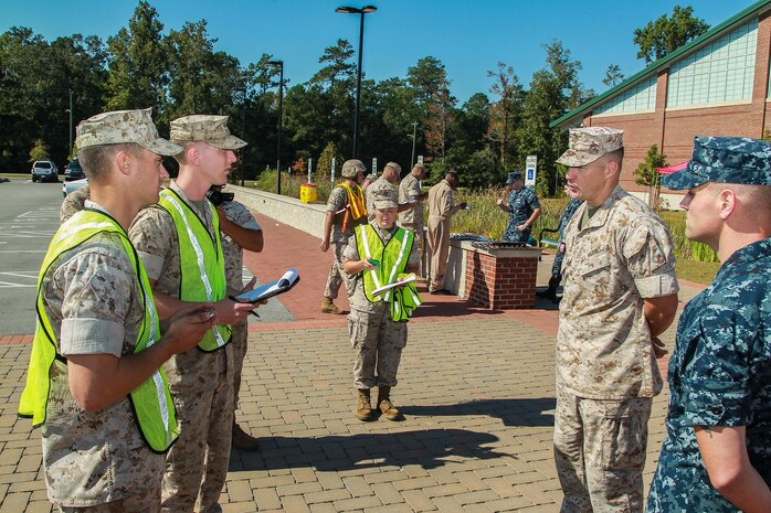 U.S. Service members conduct a press conference during Exercise Vigilant Response 2014 (VR14) aboard Marine Corps Air Station New River, N.C., Oct. 8, 2014. VR14 is a two-day exercise designed to test the ability to conduct command and control measures in response to a pandemic outbreak.