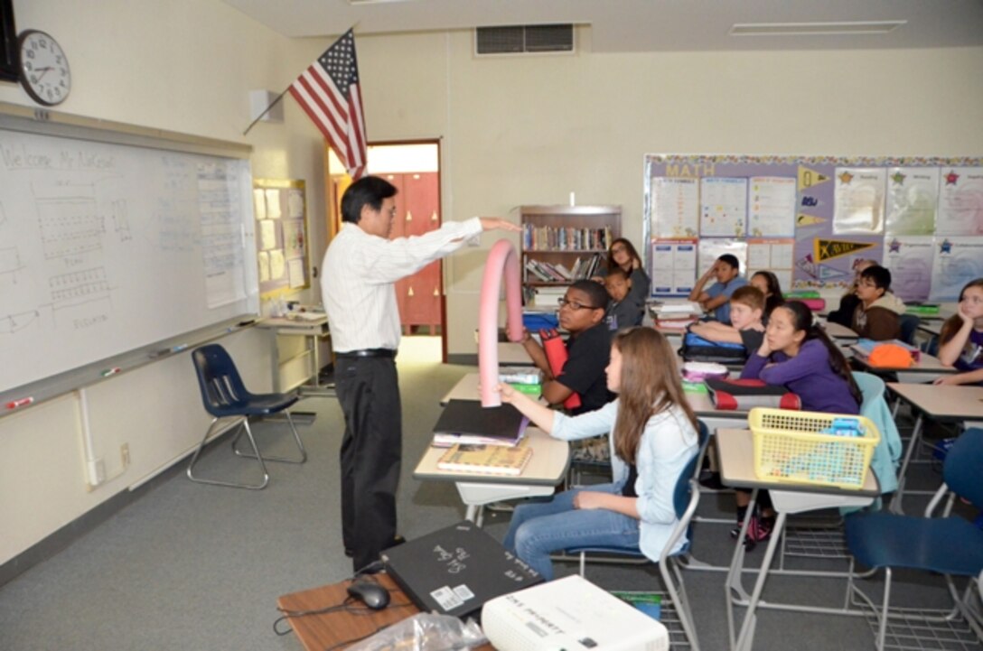 Japan Engineer District Civil Engineer Glenn Nakasaki recently spoke with Zama American Middle School seventh grade advanced math students about how math is used to design bridges. The students learned about how math is important to calculate weight as well as tension and compression. Part of the Science Technology Engineering and Math (STEM) activities currently promoted by Army leaders, the class was organized to allow students visualize how their skills are used in the real world. 