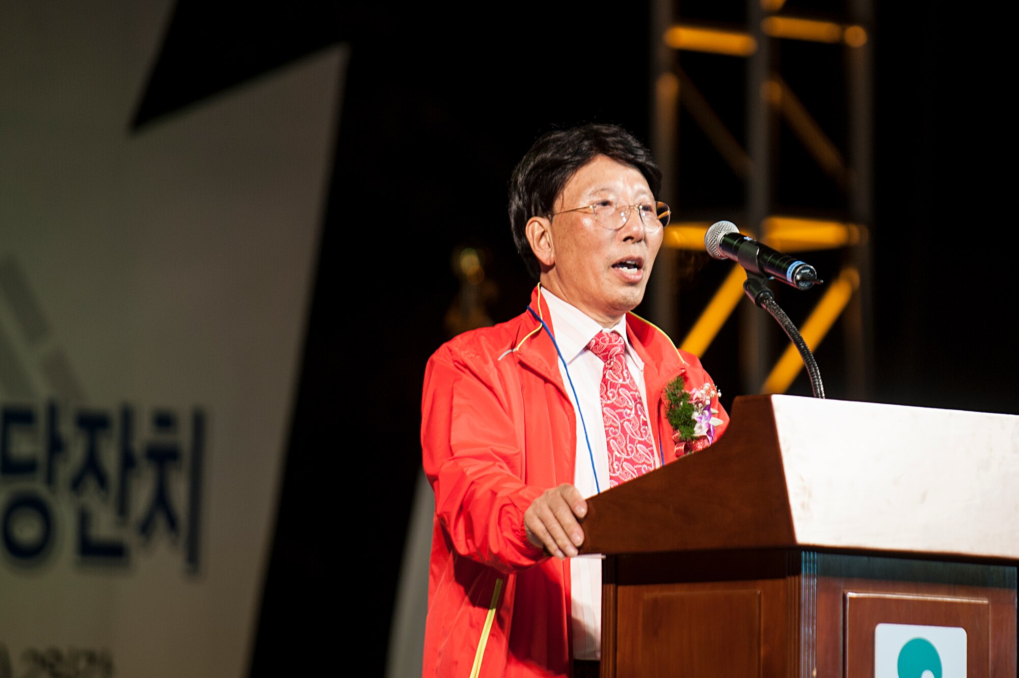 Mr. Pak, Chu Sop, Songtan Chamber of Commerce and Industry president, provides opening remarks during the opening ceremony of the 11th Korean American Friendship Cultural Festival at the Songtan Entertainment District, Republic of Korea, Oct. 25, 2014. The festival was sponsored by the Songtan Chamber of Commerce and celebrates the great friendship between Koreans and Americans. (U.S. Air Force photo by Senior Airman Matthew Lancaster)