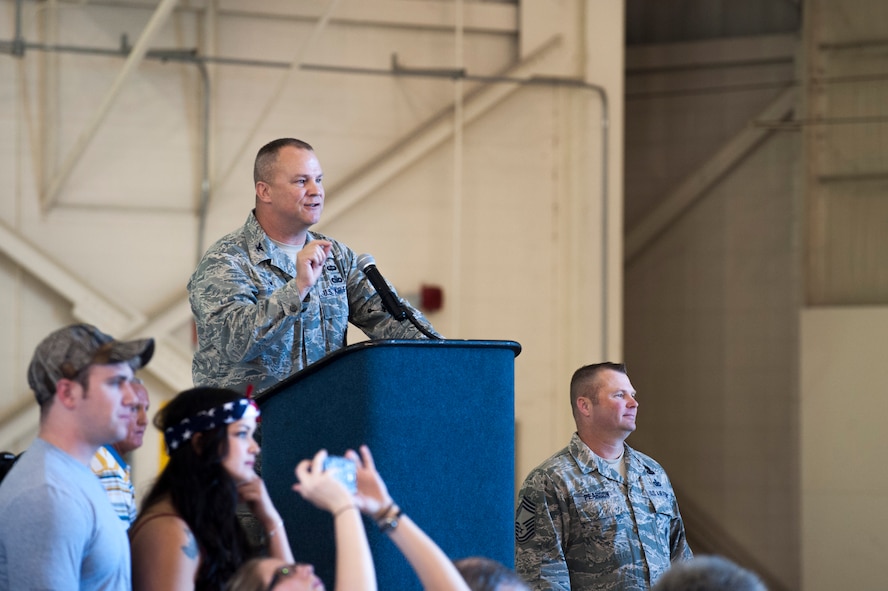 U.S. Air Force Col. Mike Ross, 820th Base Defense Group commander, speaks at a deployment return for the 824th Base Defense Squadron Oct. 26, 2014, at Moody Air Force Base, Ga. The 820th BDG maintains three rapidly deployable base defense squadrons, the 822d, 823d, and 824th, to support global security missions. (U.S. Air Force photo by Airman 1st Class Dillian Bamman/Released)