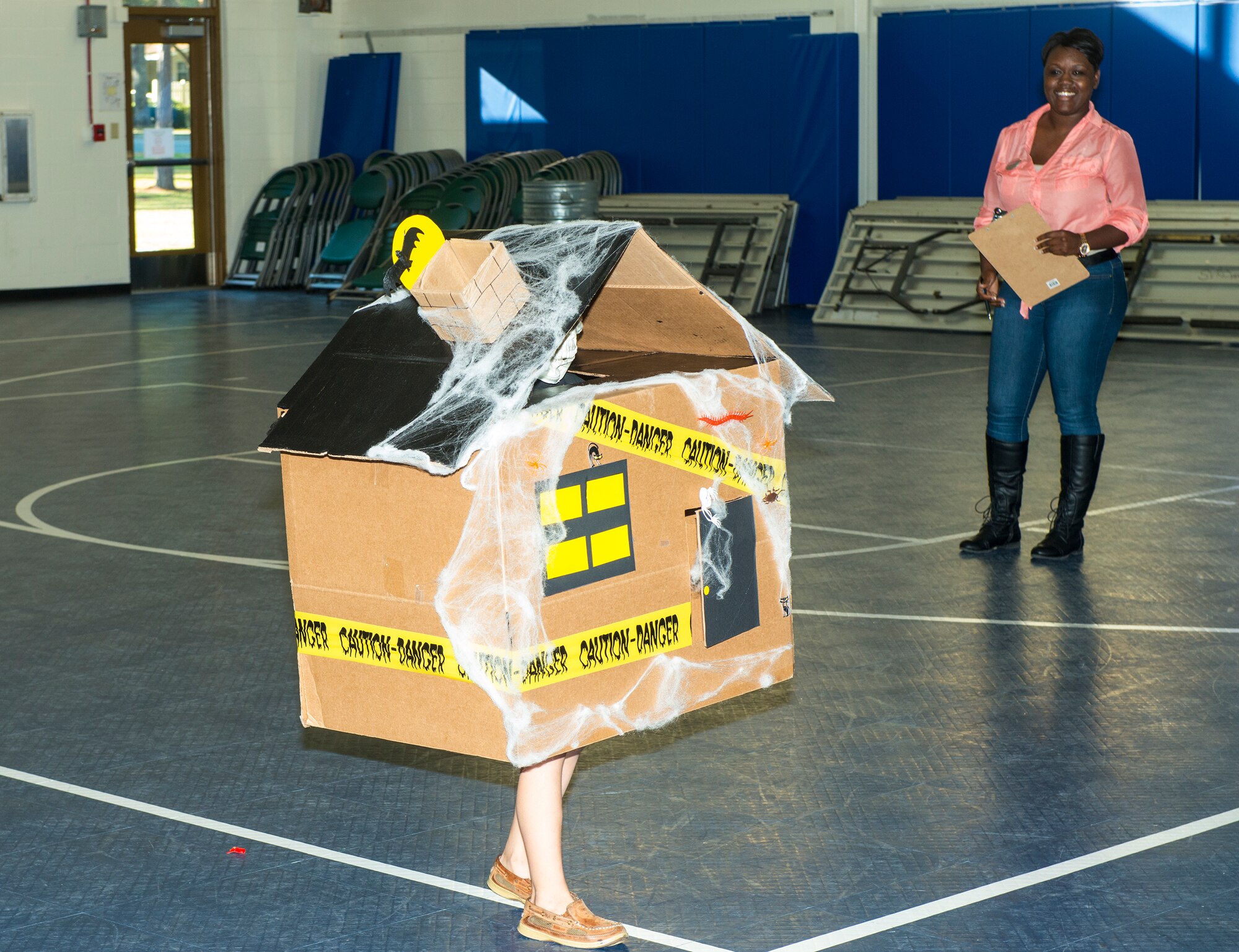 Ryan, son of U.S. Air Force Staff Sgt. Travis Baldwin, walks down the runway during the Energy Action Month Costume Contest Oct. 24, 2014, at Moody Air Force Base, Ga. Ryan was one of four winners who received free tickets to a local haunted house. (U.S. Air Force photo by Airman 1st Class Ceaira Tinsley/Released)