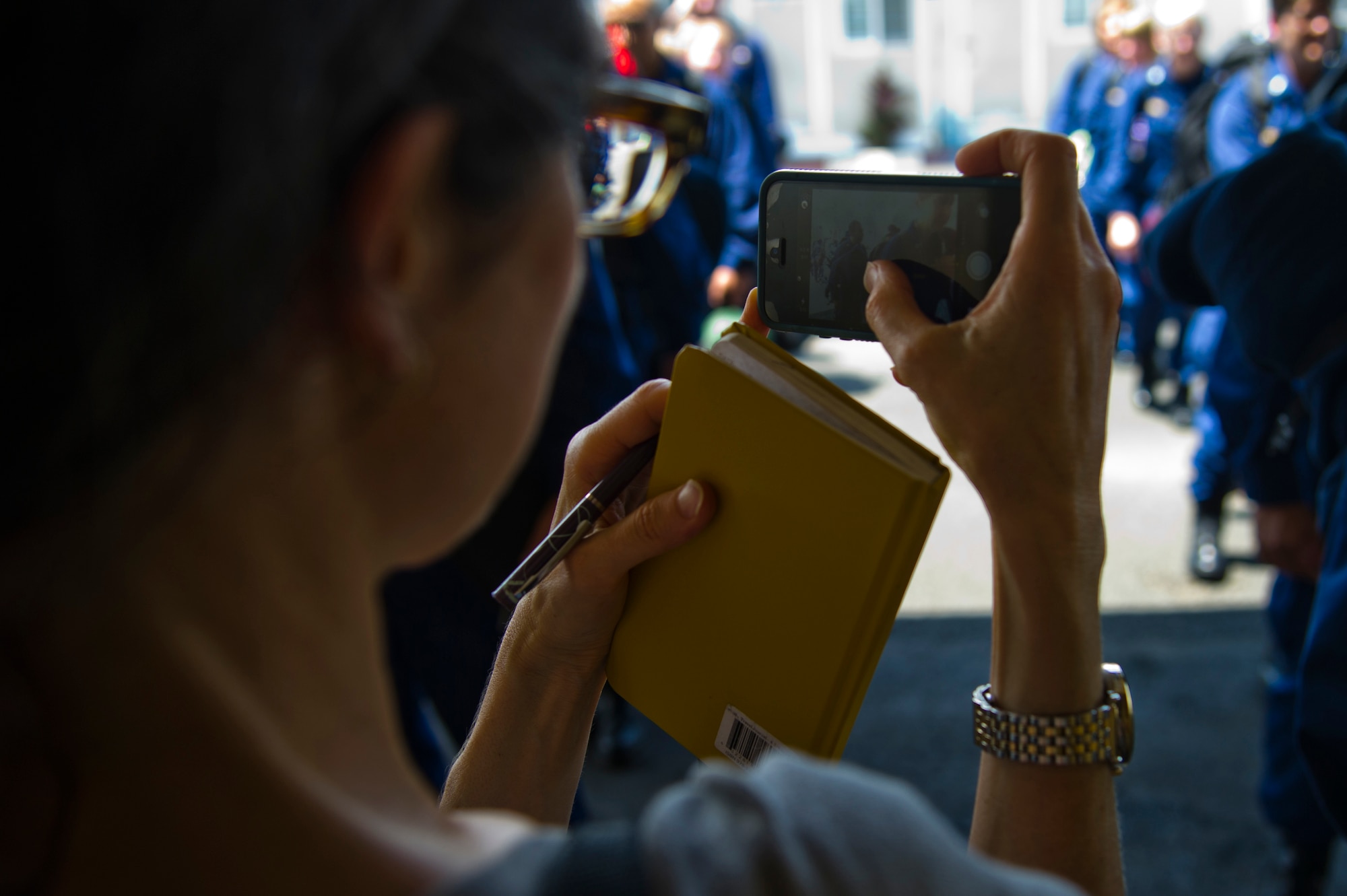 ROBERTS INTERNATIONAL AIRPORT, Republic of Liberia - A reporter takes a photo of local Liberians checking the temperature of members of the U.S. Public Health Service shortly after arrival as a precautionary here, during Operation UNITED ASSISTANCE, October 27, 2014. The medical staff of the USPHS will aid Ebola patient medical staff who need medical care. OUA is a U.S. Africa Command-led operation to provide command and control, logistics, training and engineering support to the U.S. government’s efforts to contain the Ebola virus outbreak in West African nations. (U.S. Air Force photo/Staff Sgt. Gustavo Gonzalez/RELEASED)