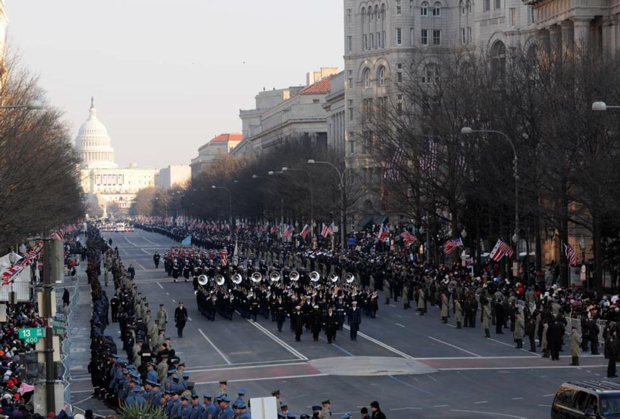 Parade participants march down Pennsylvania Avenue during the 2009 presidential inaugural parade in Washington, D.C., Jan. 20, 2009. Ceremonial support is one of three core mission sets that AFDW is responsible for. This support can vary from participating in National Special Security Events such as the State of the Union Address or Presidential Inaugurations to providing official honors during funerals at Arlington National Cemetery. (DOD photo by Mass Communication Specialist 2nd David Coleman, U.S. Navy/Released)
