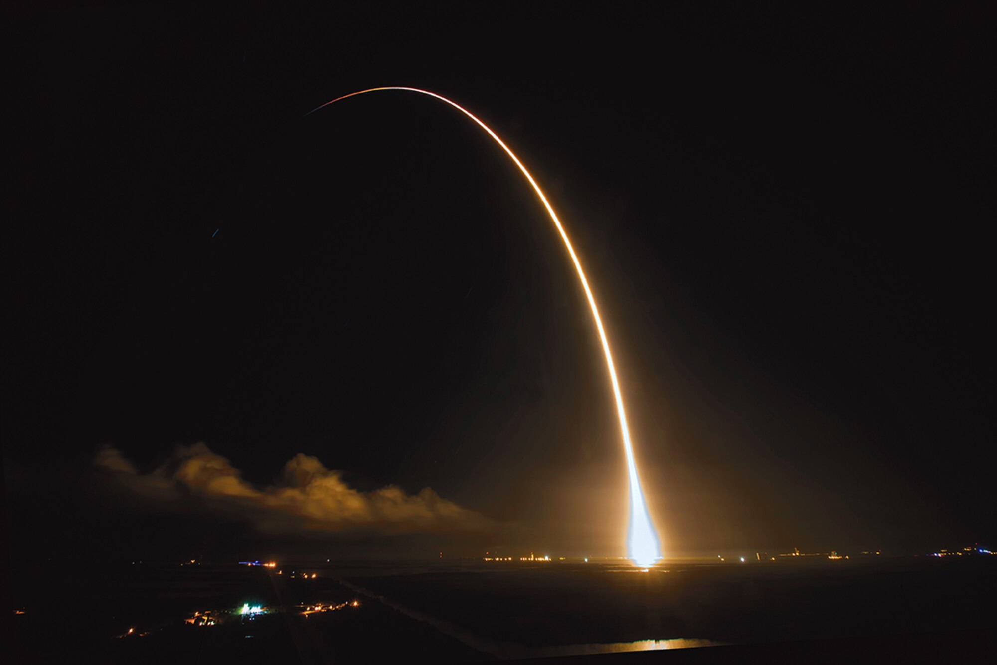 A SpaceX Falcon 9 Dragon is launched from Cape Canaveral Air Force Station, Fla., on Sept. 21. This type of rocket type will carry the Deep Space Climate Observatory, which involved Kirtland personnel, into space in January. (Courtesy photo)