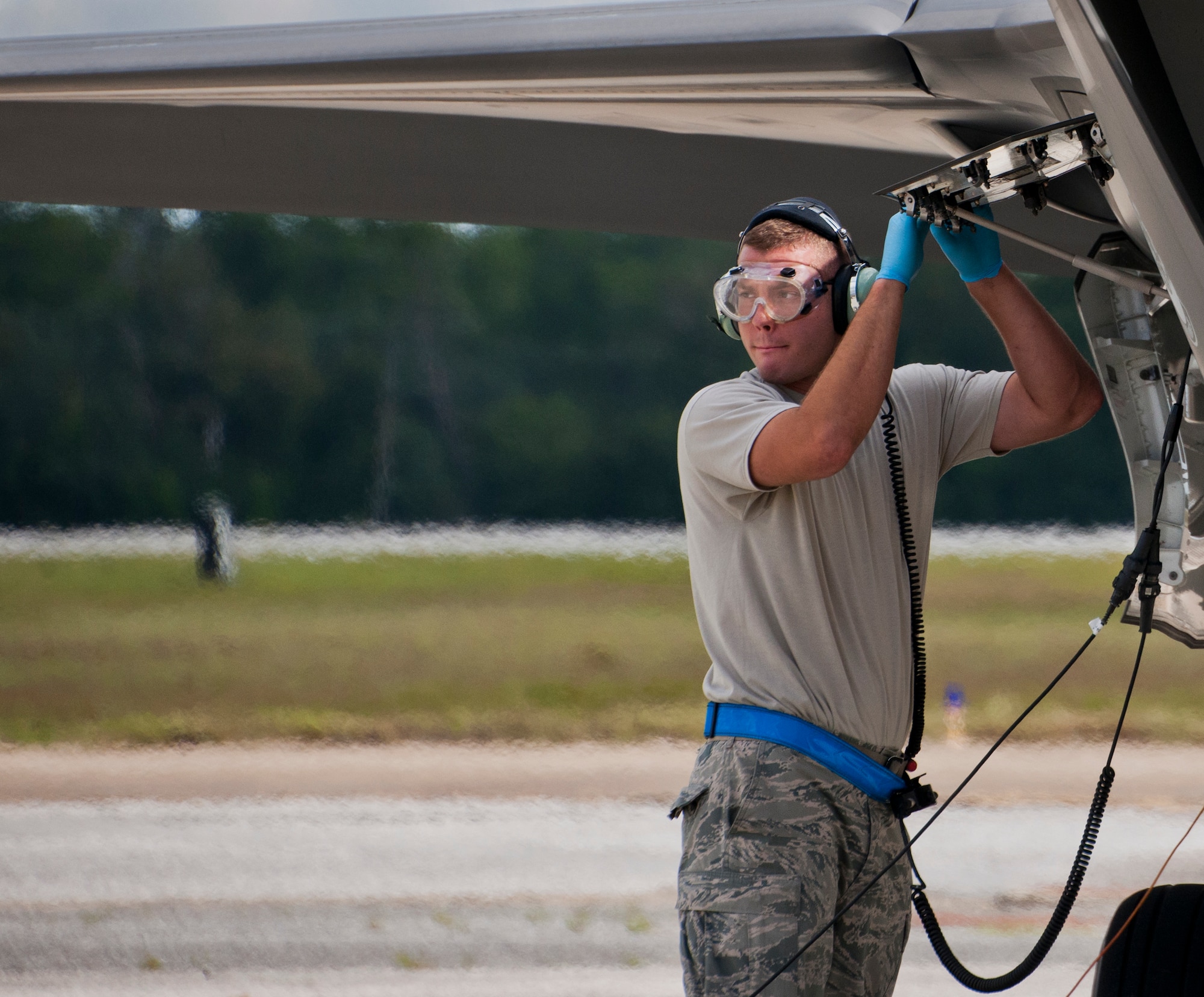 Staff Sgt. Chris Hunter, 33rd Aircraft Maintenance Squadron, completes aircraft checks after an F-35A Lightning II refueling session on the 33rd Fighter Wing flightline at Eglin Air Force Base, Fla.  All of the F-35 variants use the refueling areas in conjunction with the 96th Logistics Readiness Squadron’s fuels flight. (U.S. Air Force photo/Samuel King Jr.)