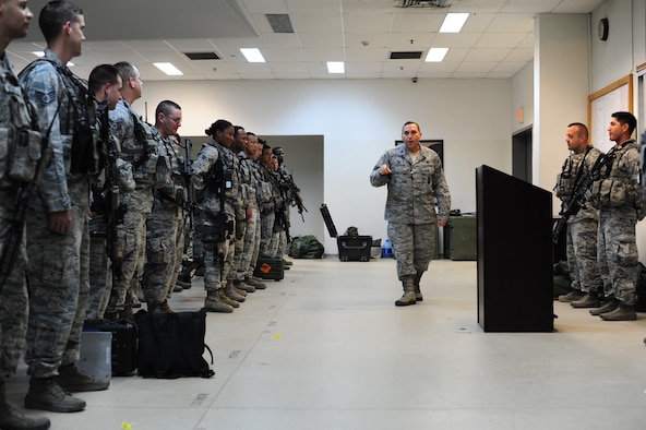 Lt. Col. Joseph Musacchia, 39th Security Forces Squadron commander, briefs defenders at guard mount, Oct. 21, 2014, Incirlik Air Base, Turkey. Musacchia took command of the 39th SFS March 14, 2013. (U.S. Air Force photo by Staff Sgt. Eboni Reams/Released)