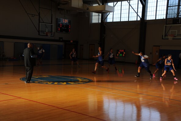 Team hopefuls work on defensive fundamentals during All Air Force women’s basketball tryouts at Maxwell Air Force Base Oct. 20. Selected Airmen from around the globe compete for two weeks in hopes of representing the Air Force in the Armed Forces Basketball Championship tournament at Camp Pendleton, Calif., in November. (U.S. Air Force photo by Senior Airman William Blankenship)