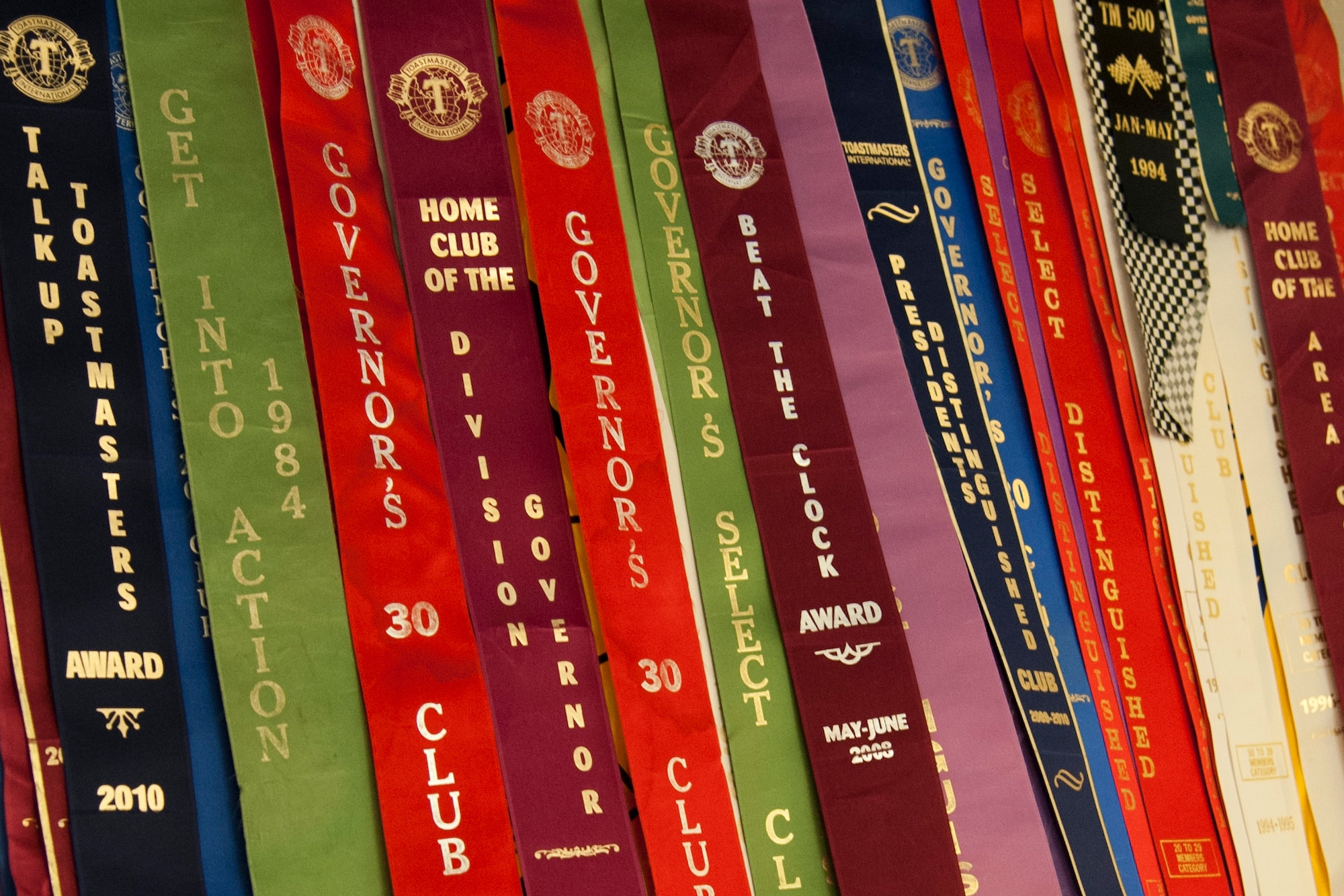 PETERSON AIR FORCE BASE, Colo. – A banner adorned with ribbons won by Team Pete Toastmasters over the years sits outside of the weekly Toastmasters meeting at the base chapel Oct. 21. Toastmasters is an organization with more than 313,000 members in 126 countries helping its members improve and master the skill of public speaking. (U.S. Air Force photo/Staff Sgt. Aaron Breeden)