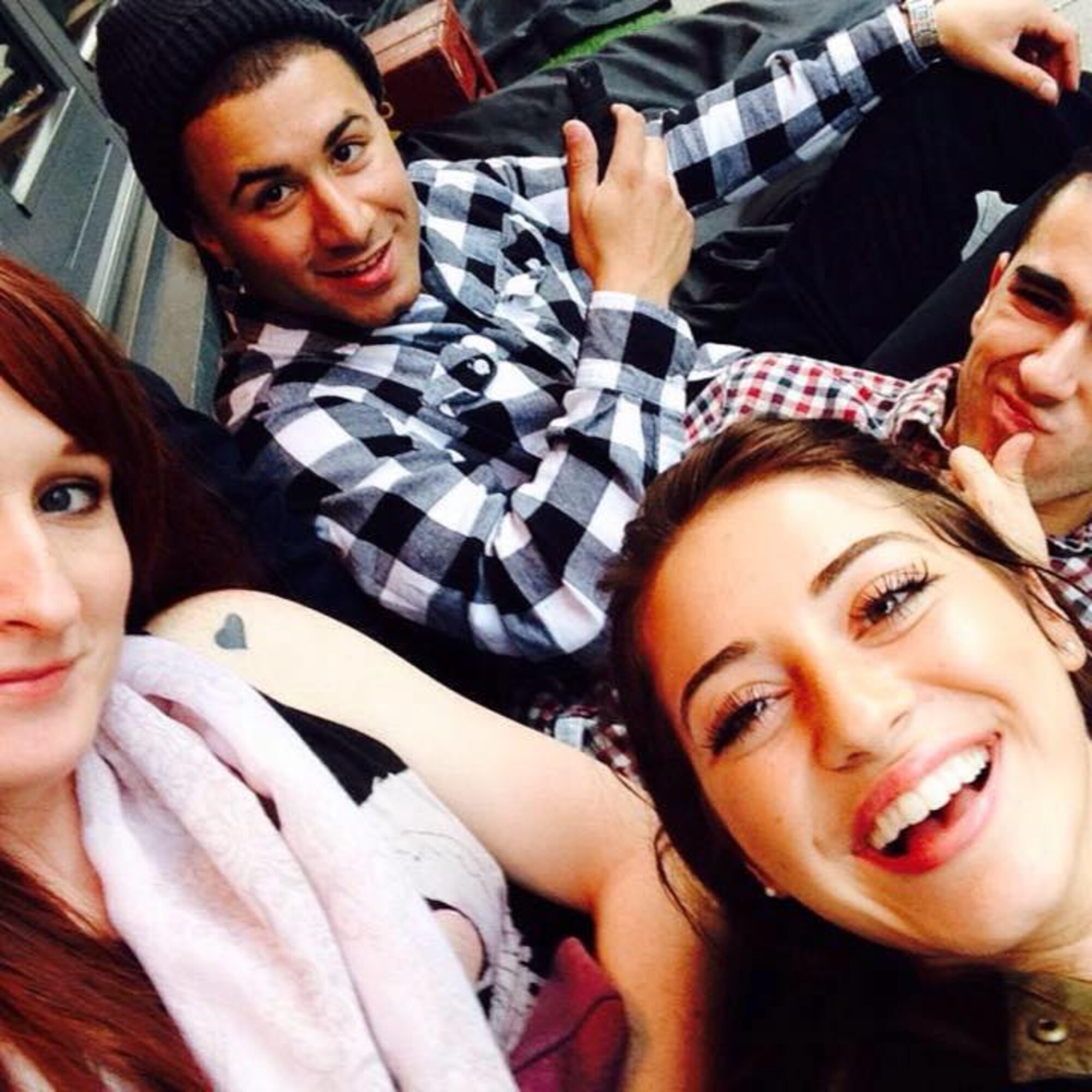 Senior Airman Giovanni Pinzon, a former 86th Ammunitions Squadron conventional maintenance crew chief, top left, lounges outside a hostel common area with friends after a recent trip to Copenhagen, Denmark. Pinzon is an advocate of frequent travels as a way to increase morale. (Courtesy photo)