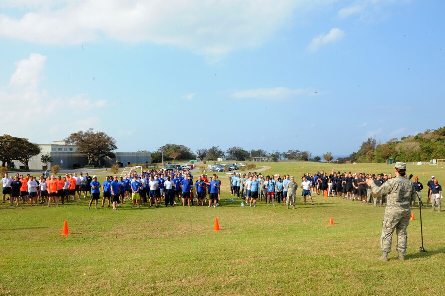 U.S. Air Force Col. Debra Lovette, 18th Mission Support Group commander, gives an opening speech to start off the 2014 MSG sports day on Kadena Air Base, Japan, Oct. 24, 2014. The group has its sports day every year where it brings together all of the squadrons in the group and lets them battle it out in a series of sporting events throughout the day. (U.S. Air Force Photo by Airmen 1st Class Stephen G. Eigel/Released)