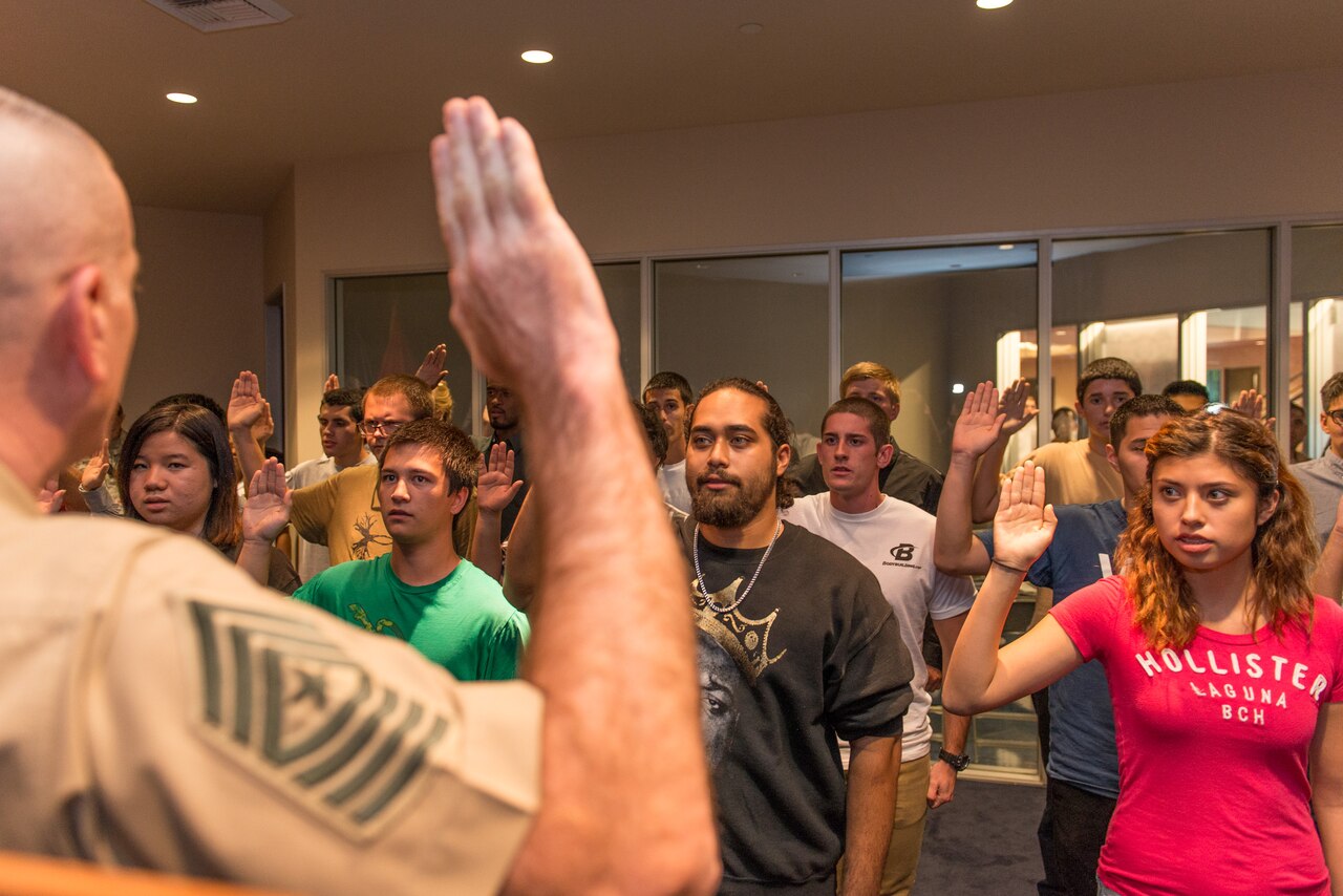 Marine Corps Sgt. Maj. Bryan B. Battaglia, senior enlisted advisor to the chairman of the Joint Chiefs of Staff, conducts a ceremonial oath of enlistment ceremony at the Los Angeles Military Entrance Processing Station, Oct. 21, 2014. DoD photo by Air Force Tech. Sgt. Nathan Gallahan)