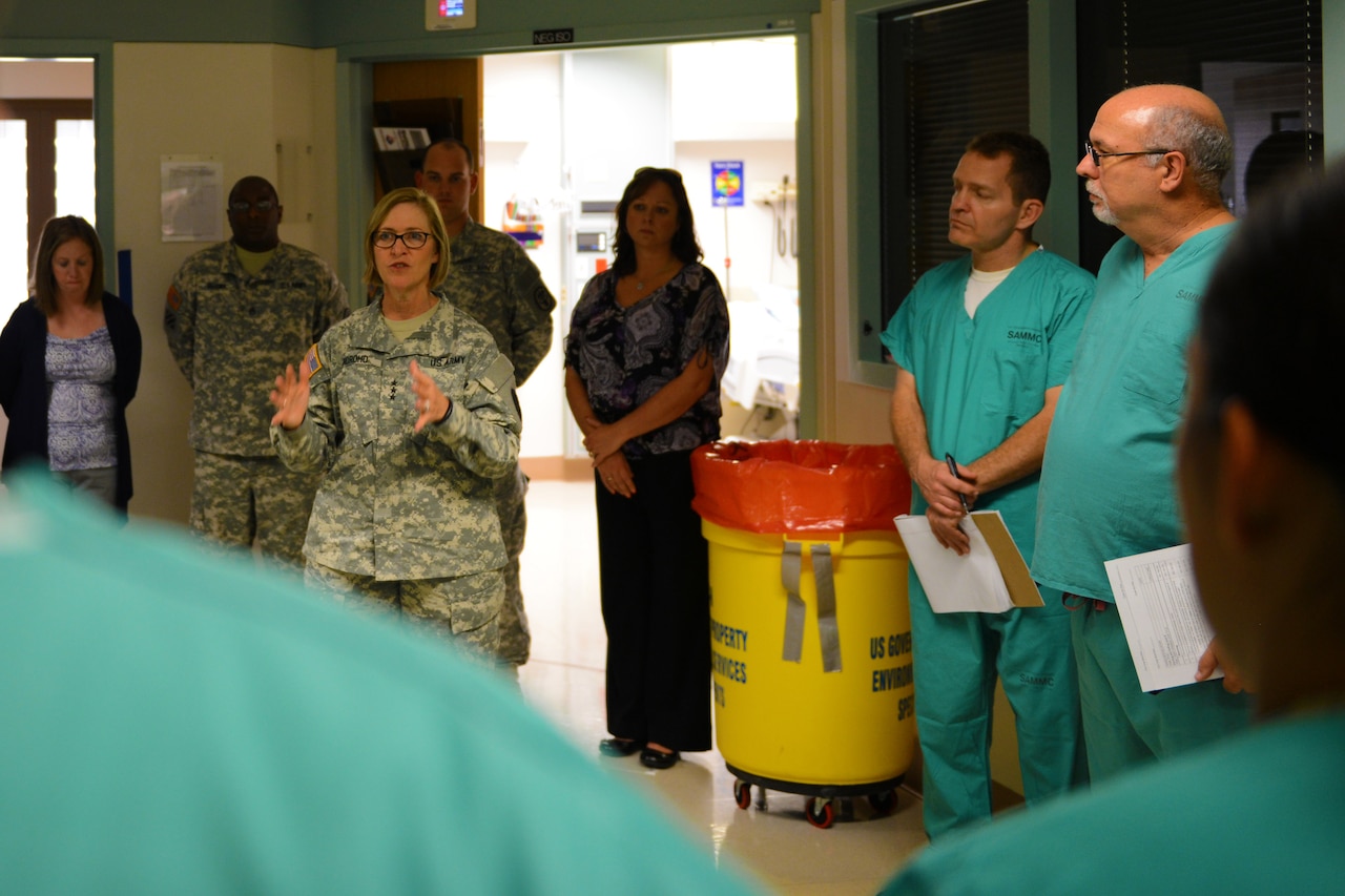 Army Surgeon General Lt. Gen. Patricia D. Horoho, center, answers concerns from members of the Defense Department’s 30-member medical support team designated for response to any potential U.S. outbreaks of Ebola during training at the San Antonio Military Medical Center in San Antonio, Texas, Oct. 24, 2014. DoD photo by Army Sgt. 1st Class Tyrone C. Marshall Jr.